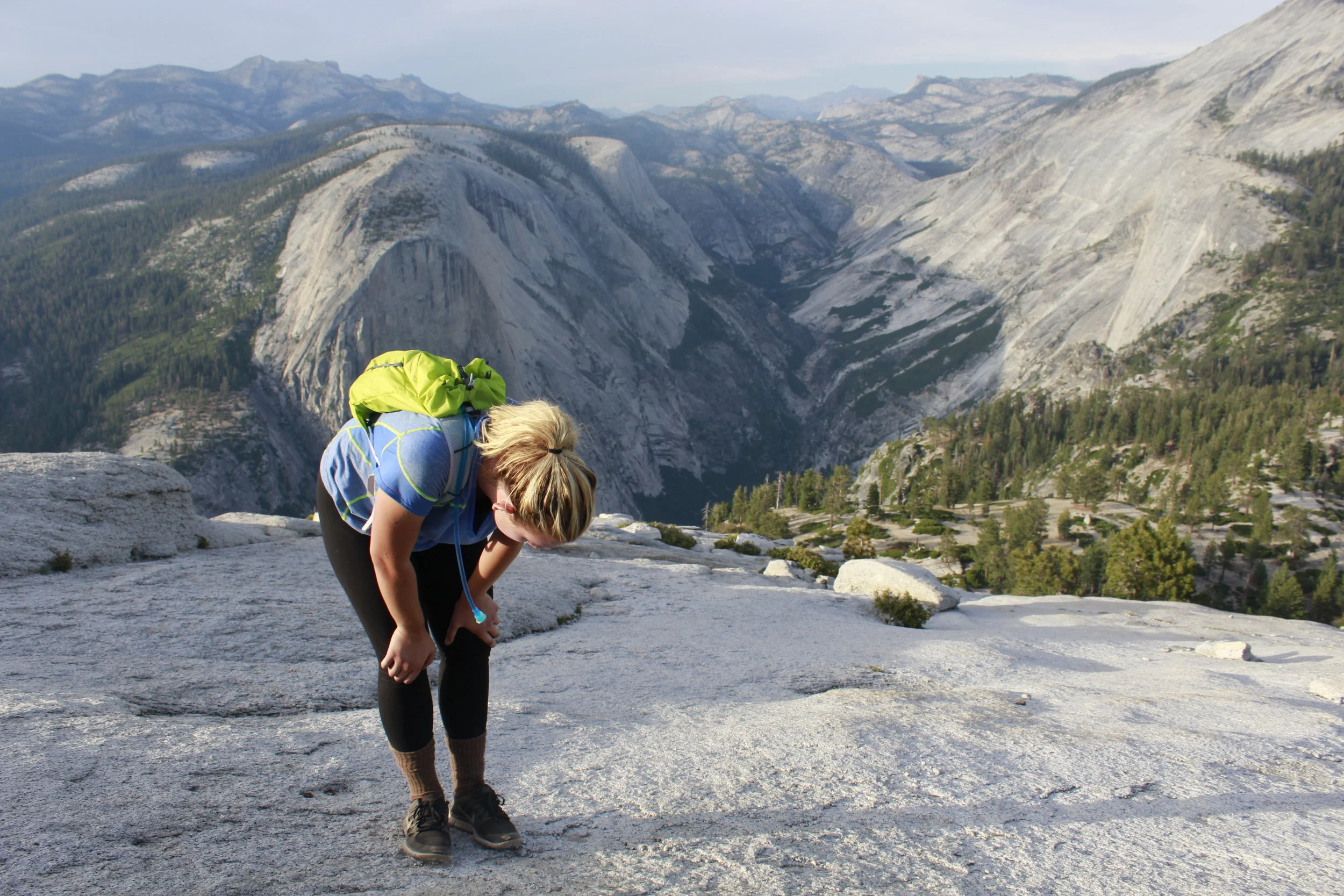 Taking a breath (or seven) after reaching quarter dome, on the way to the cables.