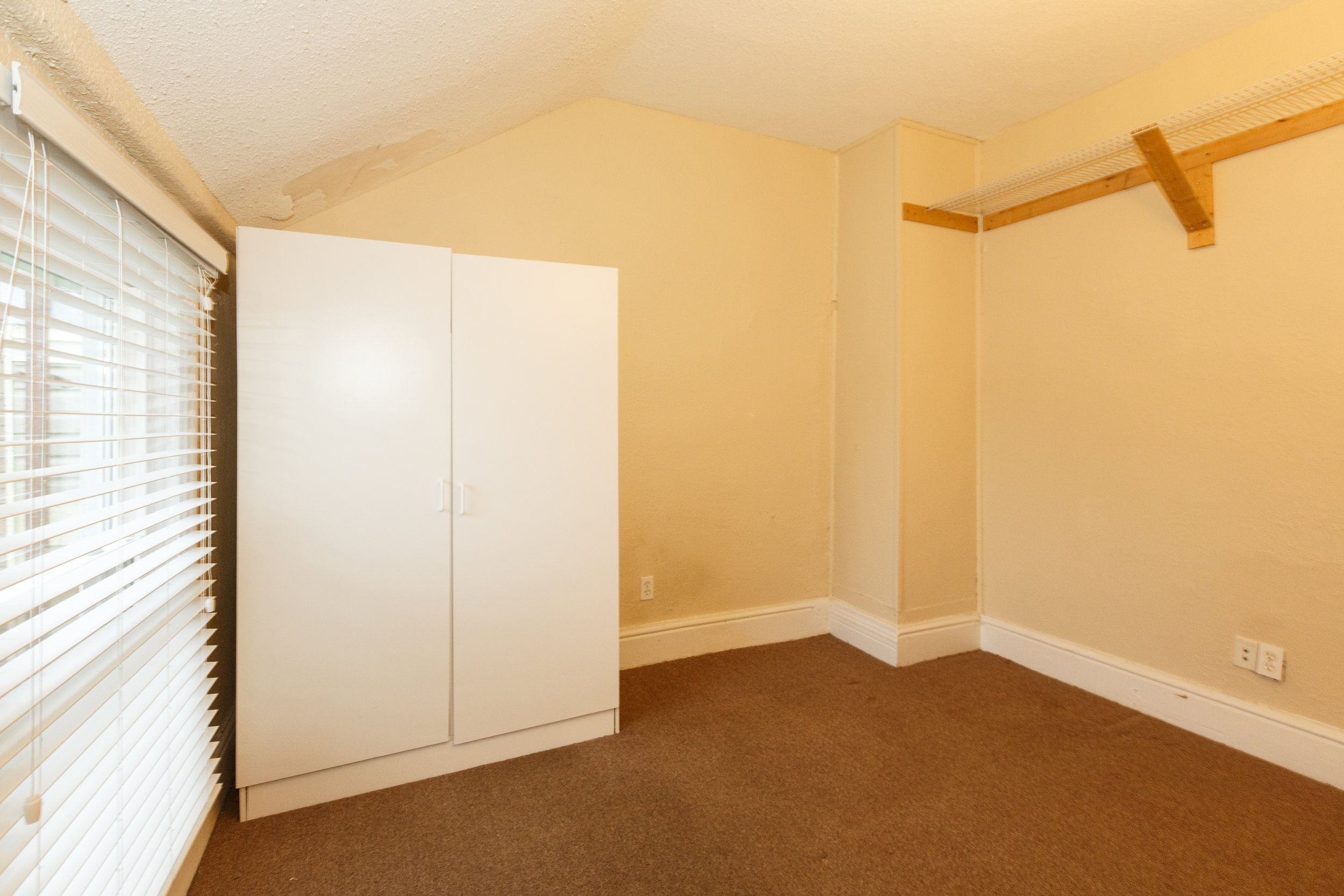 332 Brock St. _u007c_ Bedroom Photo, with wardrober shown.jpg