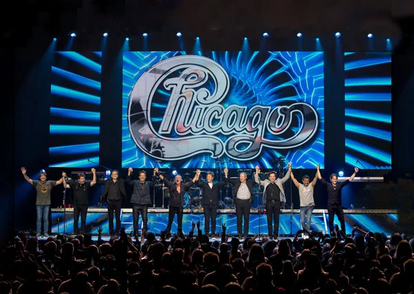 Today’s Chicago lineup: (left to right) Walfredo Reyes Jr., Keith Howland, Neil Donell, Lou Pardini, James Pankow, Robert Lamm, Lee Loughnane, Ray Herrmann, Ramon “Ray” Yslas, Brett Simons
