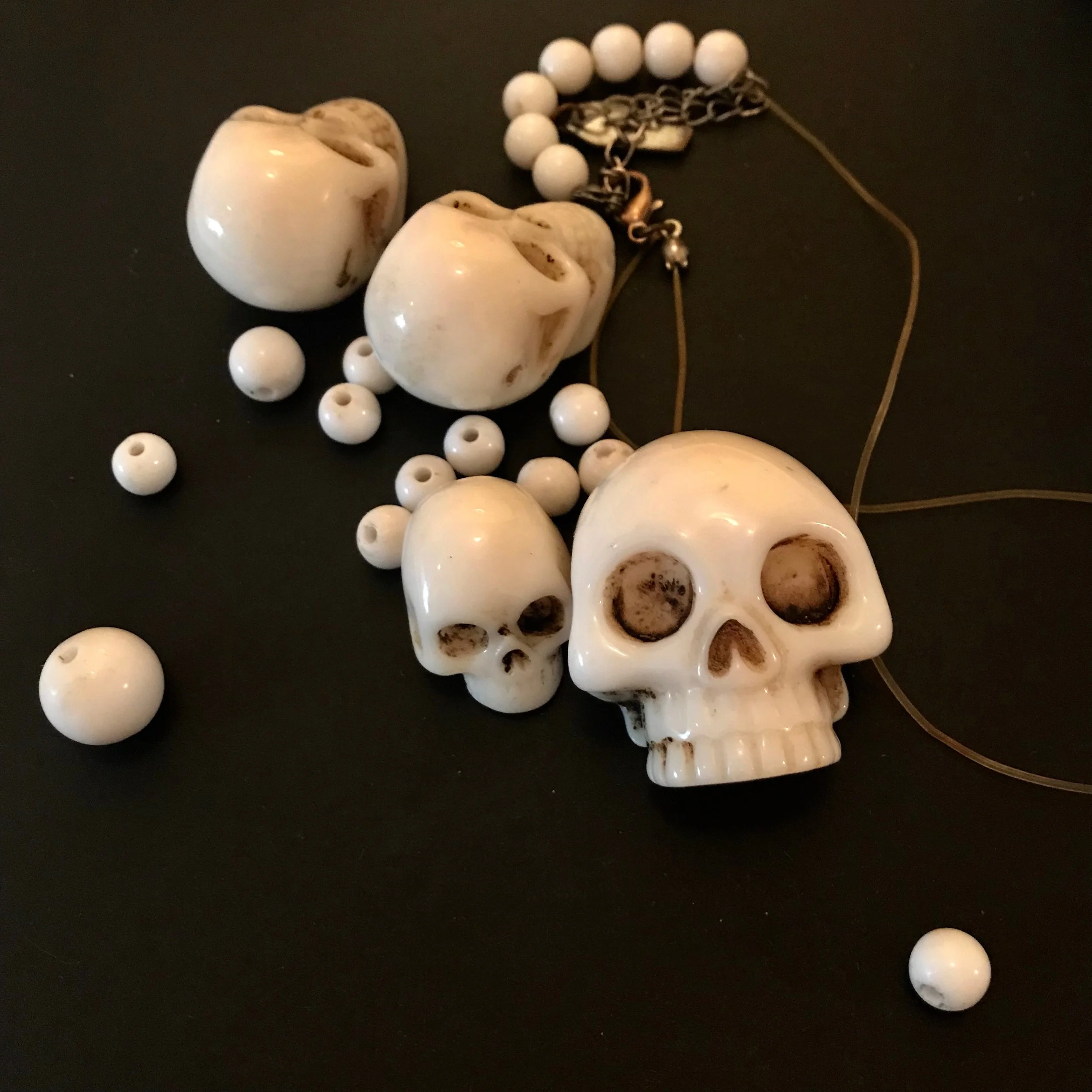 This morning I'm restringing a necklace..