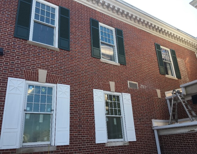 Close Up of Shutters and Brick Work