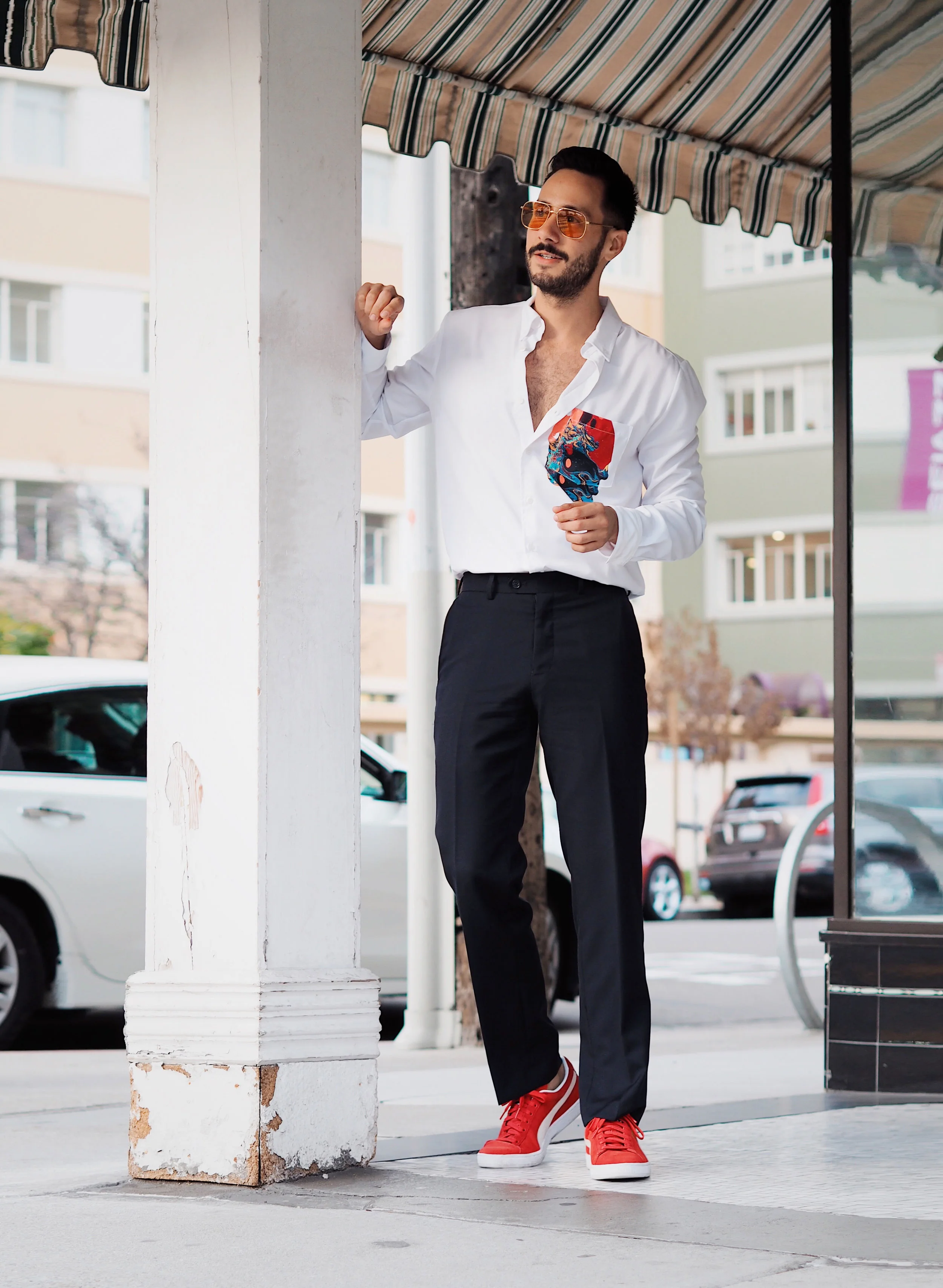 Wearing AAP custom shirt, Bar3 suit trousers, Puma suede sneakers, Vogue Eyewear sunglasses designed by Gigi Hadid