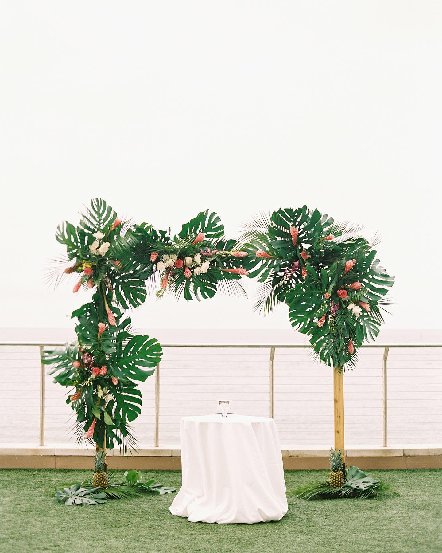 This altar is 😍😍😍 to my bloom-loving eyes. Ready and set for the sweetest vow exchange on the bay.

More to come of this insanely gorgeous tropical ceremony featured this month! Stay tuned.