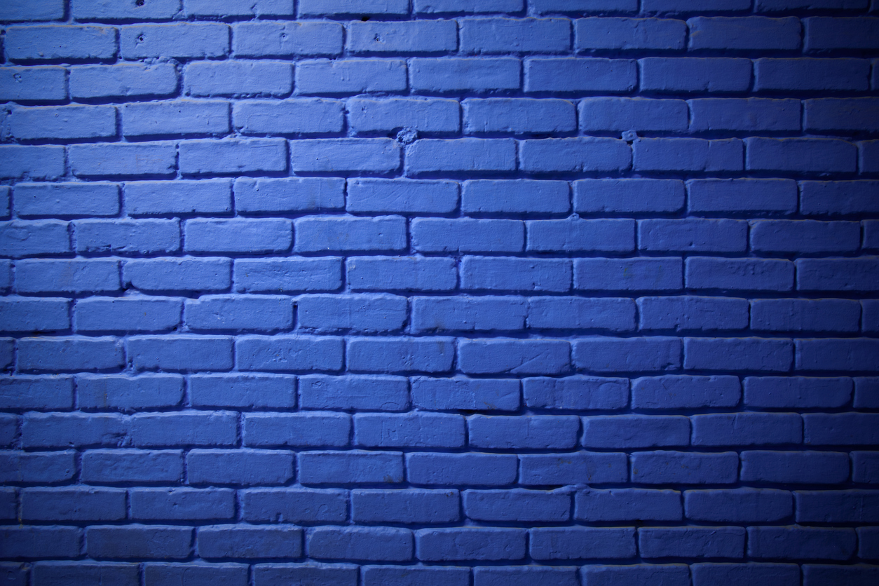 Brick wall painted blue.jpg