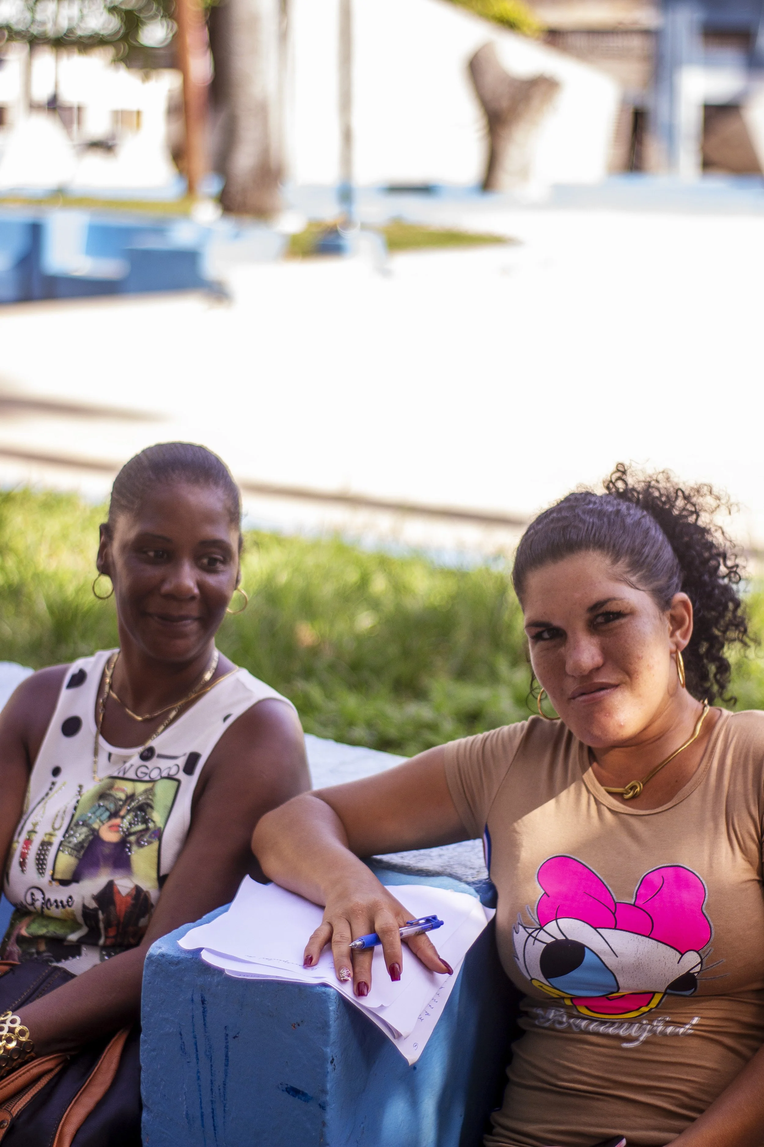 A writer with her friend at a community park