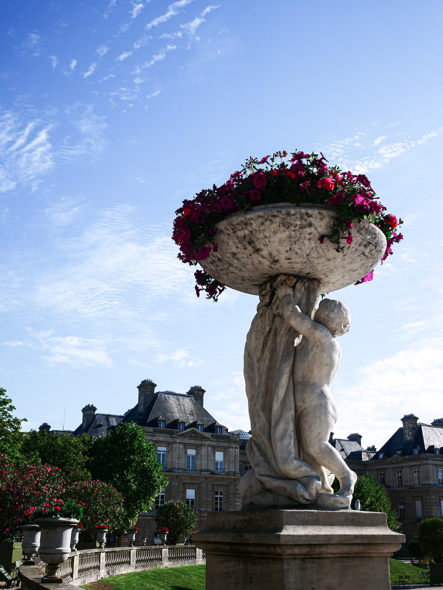 Luxembourg garden statues - visiting Paris with kids