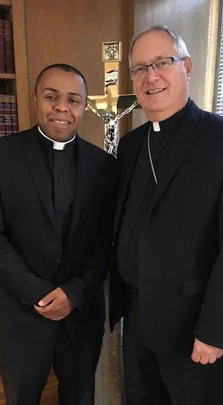 Fr. Rocha with Bishop Tobin.jpg