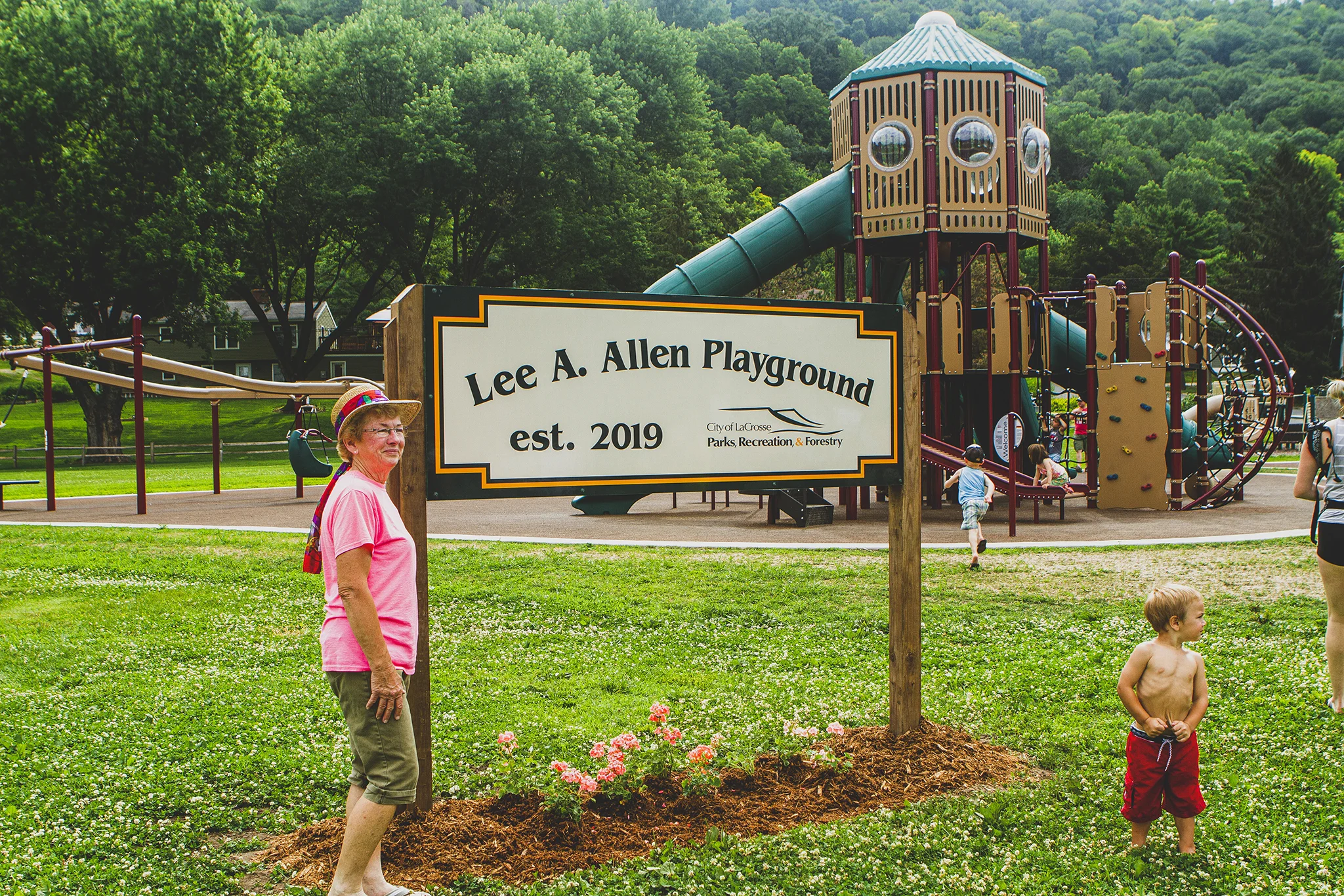 Janet Allen stands proudly at the dedication of the new Lee A. Allen Playground in La Crosse, WI