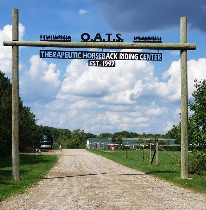 Entrance to the O.A.T.S. driveway with sign