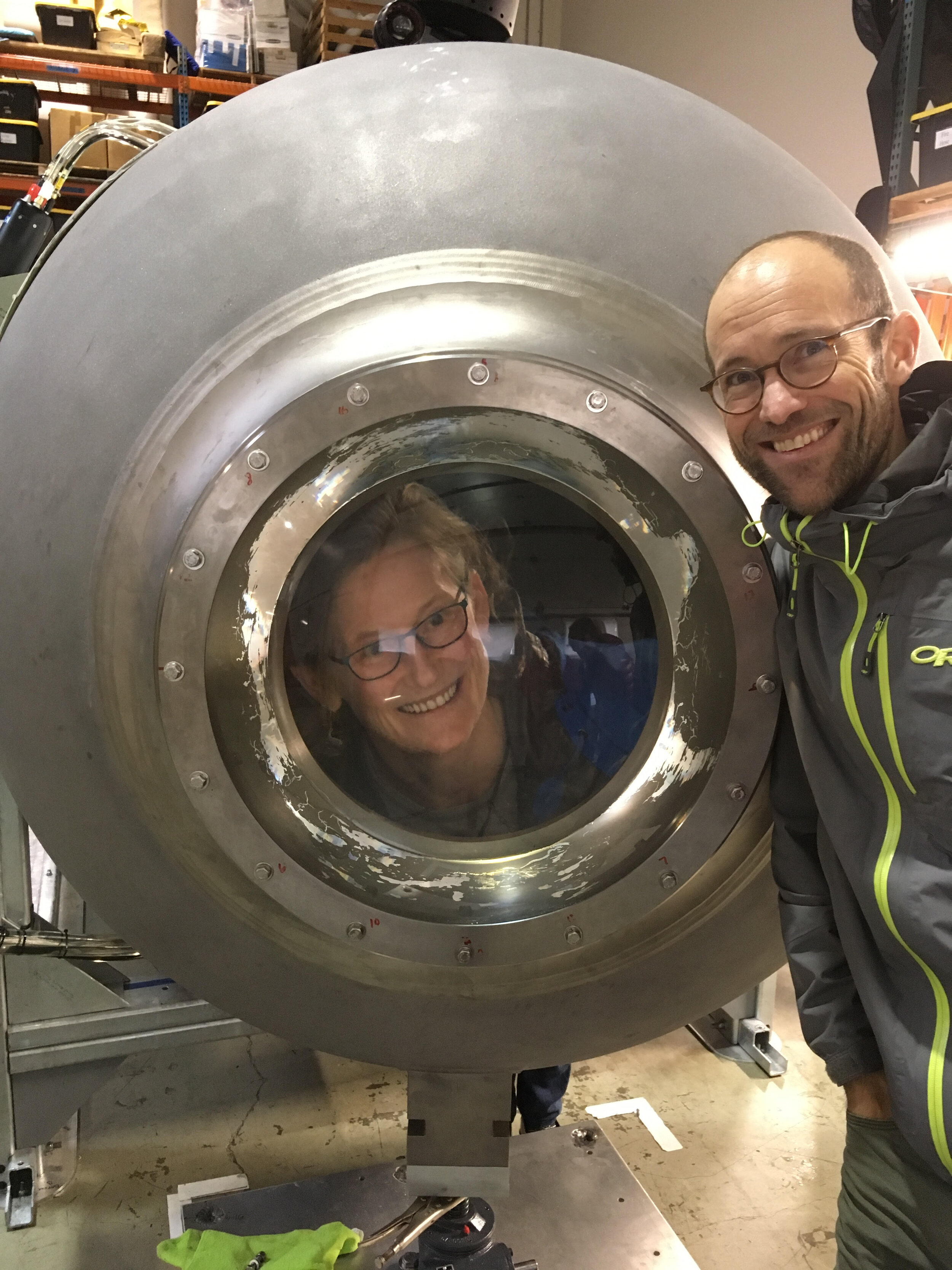  Meg peering through the porthole of the  OceanGate  Cyclops submersible. 