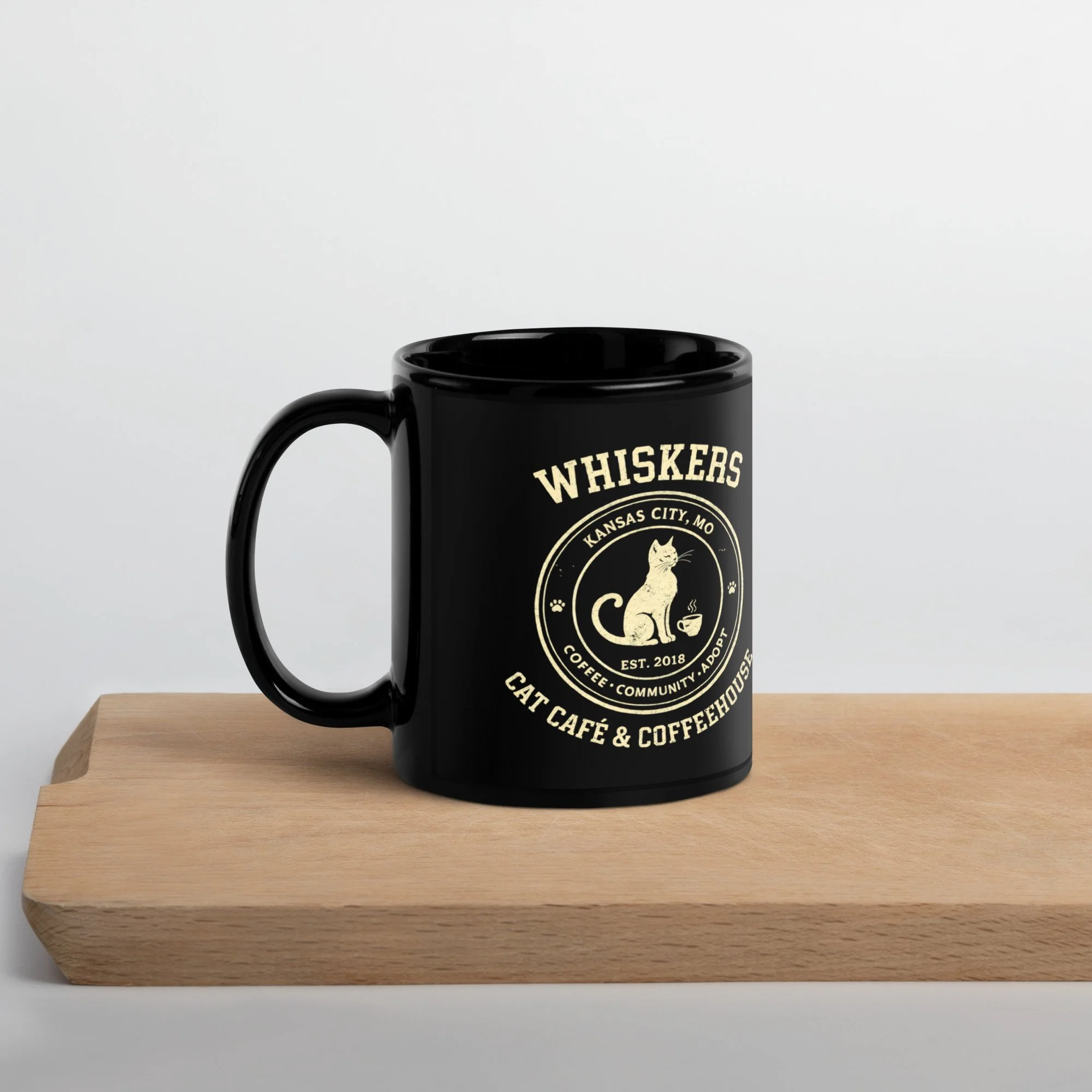 black-glossy-mug-black-11-oz-handle-on-left-699633a47531e.jpg