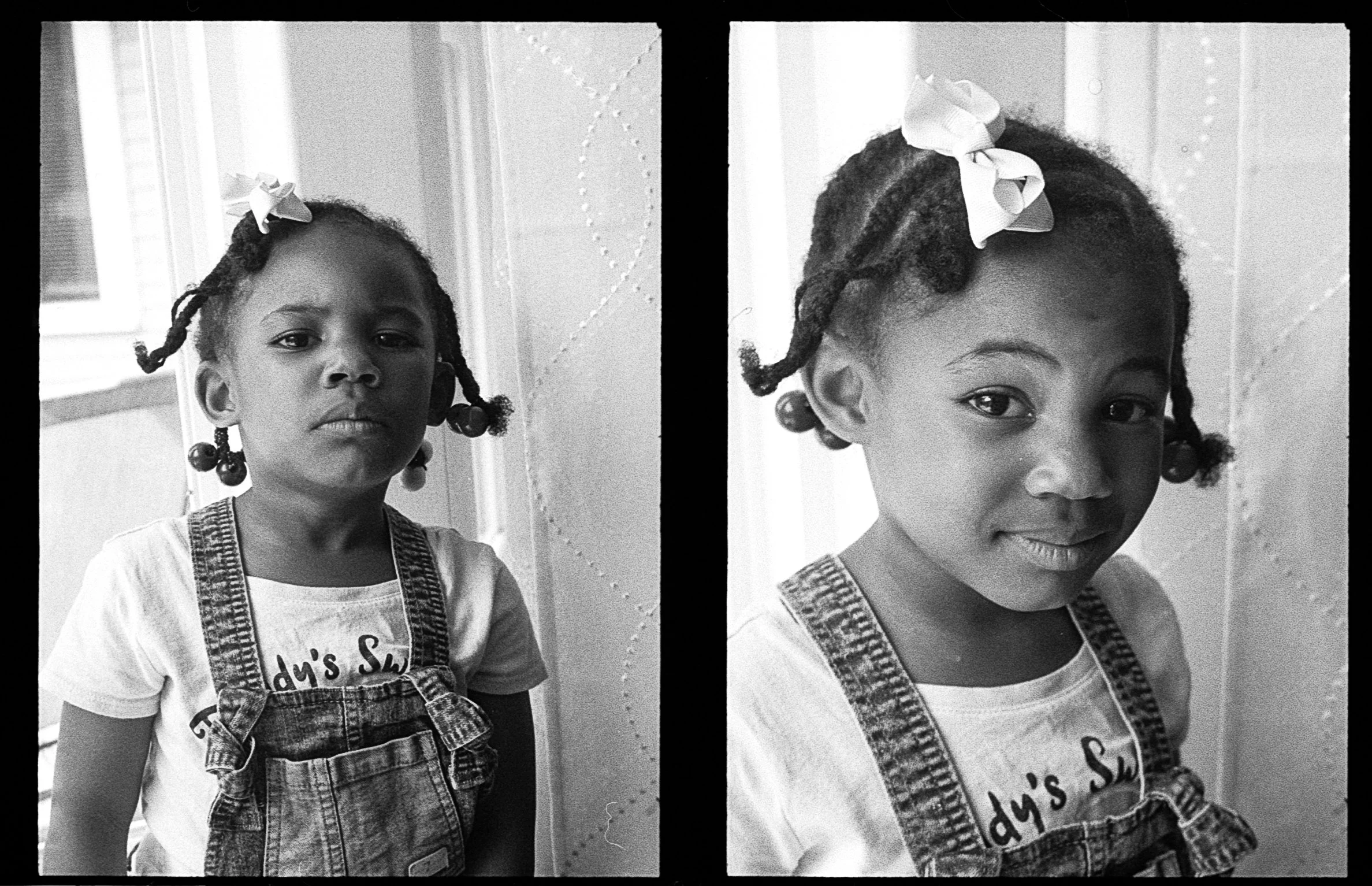 Black and white side-by-side photographs of a young girl with braided hair, wearing a bow and overalls, standing near a window and facing the camera with different facial expressions.