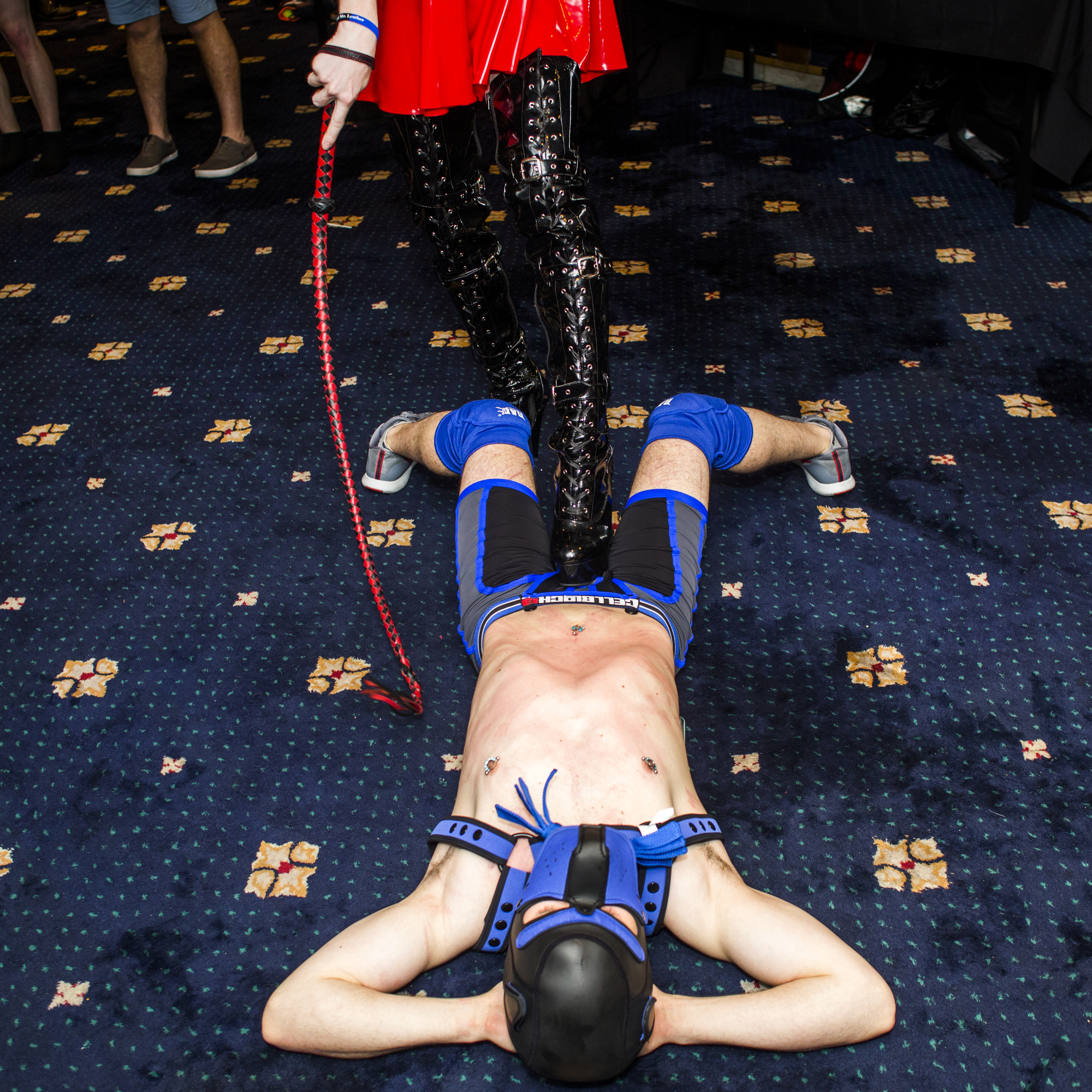  Sam Brinton, of D.C., top, whips a friend at The 40th Annual International Mister Leather Competition held in Chicago on Friday, May 25, 2018.  