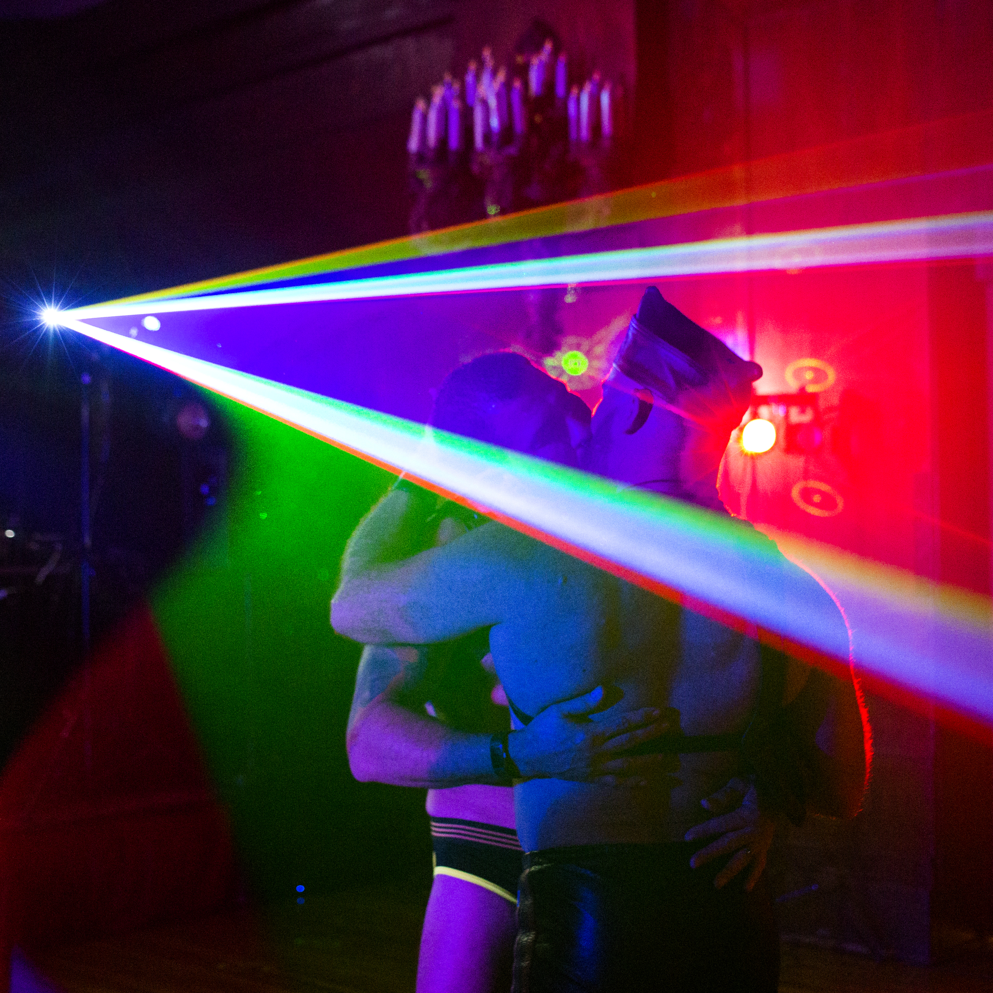  Two attendees kiss at The San Francisco Party while DJ Jack Chang, of London, DJs during the 40th Annual International Mister Leather Competition held at The Congress Plaza Hotel on Friday, May 25th, 2018.  