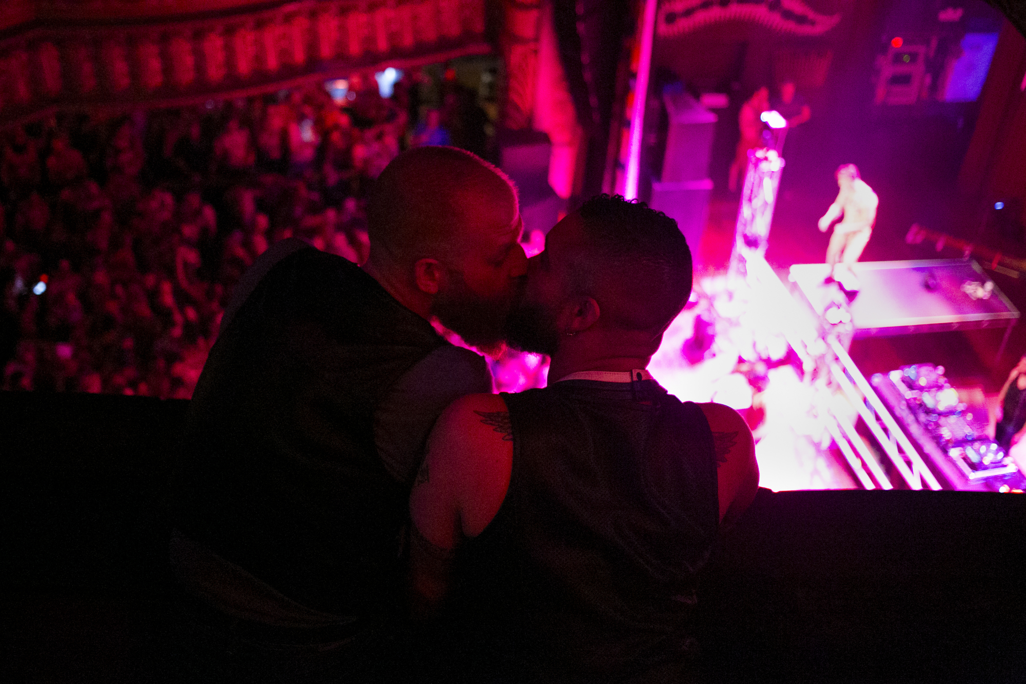  Jay Rank, right, and his partner Adam Henderson, left, winner of The 38th Annual International Mr. Leather,. kiss at the IML Victory Party held at The House of Blues in Chicago, on Sunday, May 29th, 2016. 