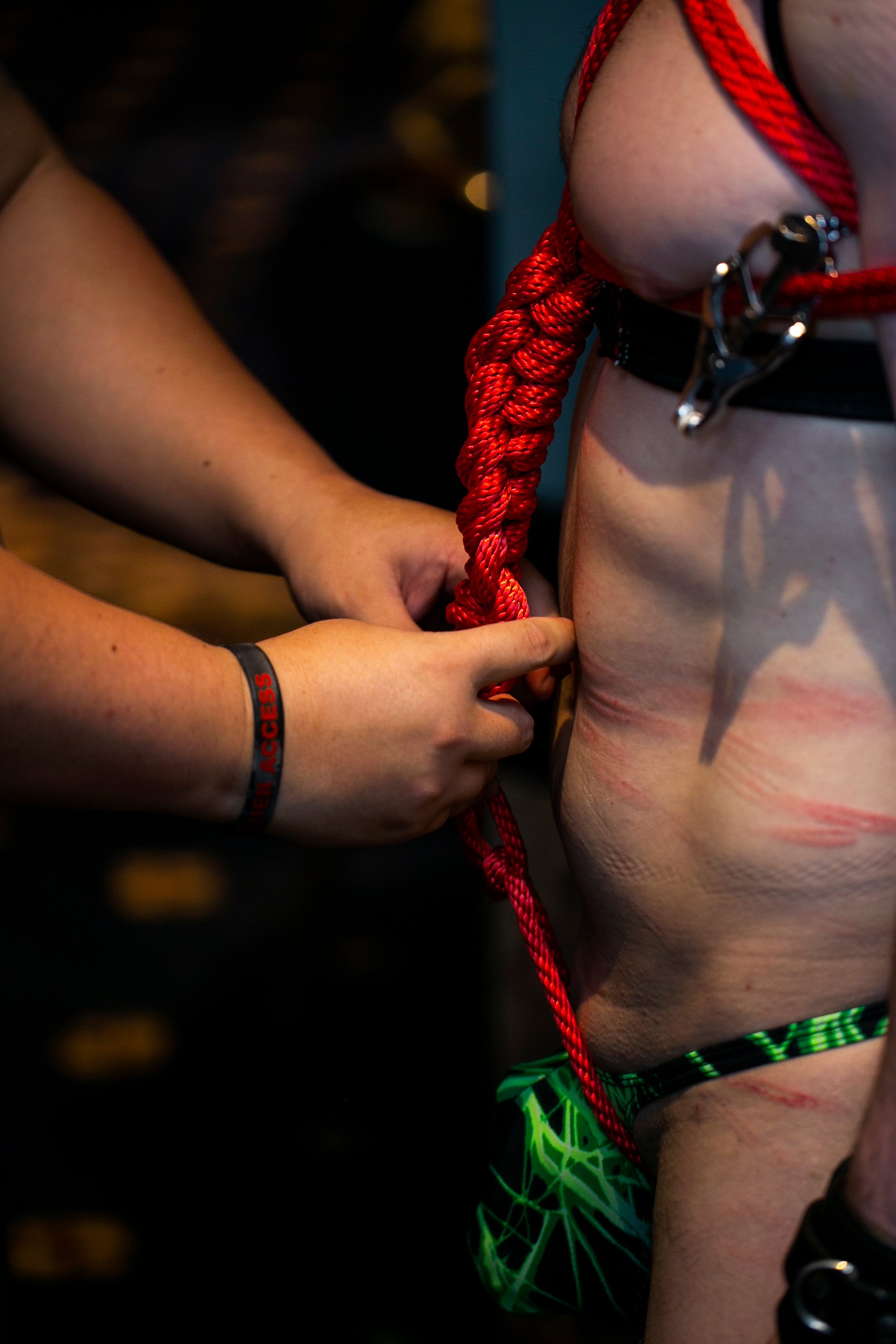  David, left, practices Shibari on a friends during the “Gear Blast,” party, Saturday, May 28th, 2022. 