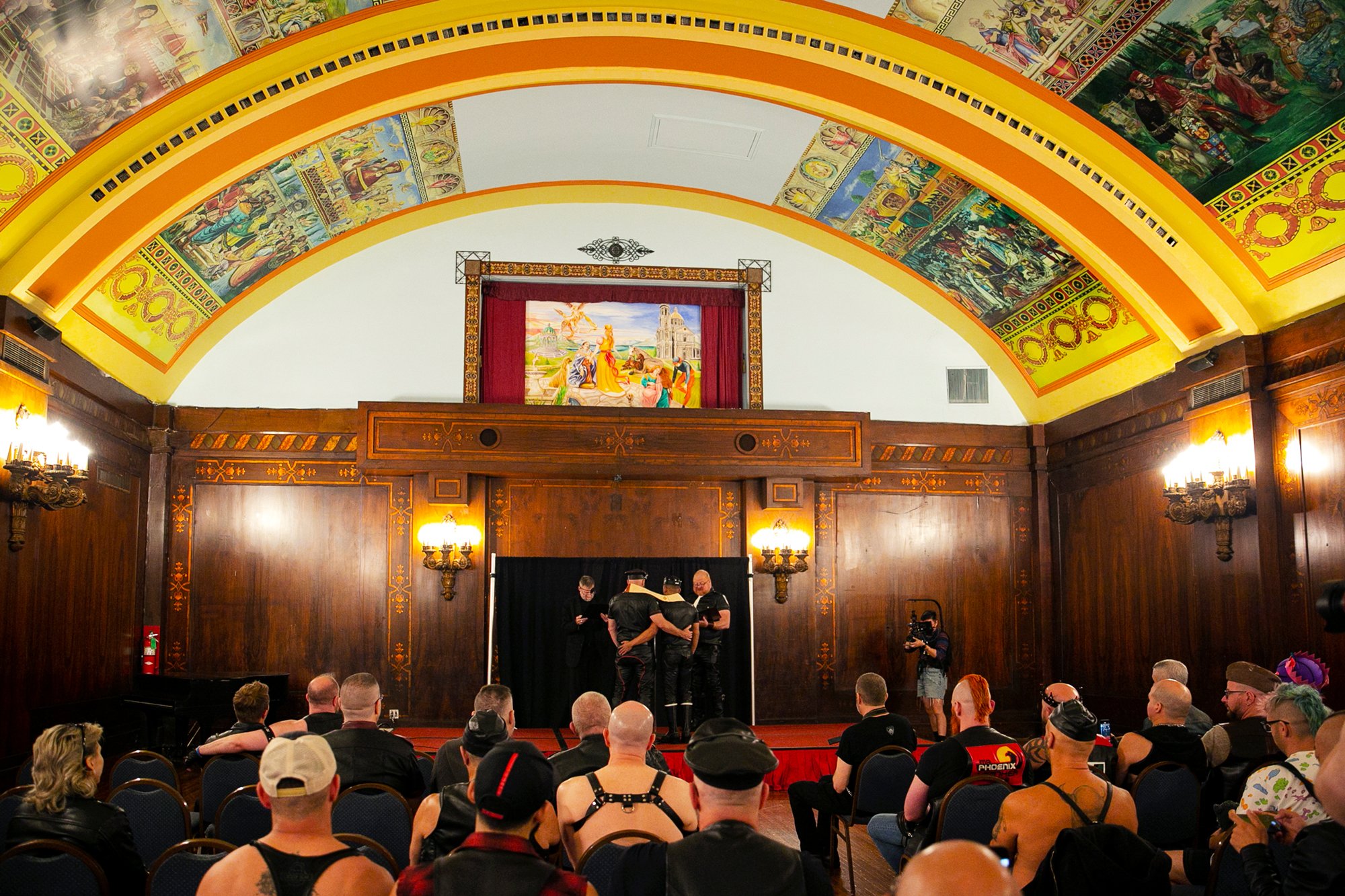  Sam, left and Oscar, right, are married in The Florentine Room during International Mister Leather 45, held at The Auditorium Theater, Saturday May 27, 2023, Chicago, IL.   The couple chose to be married at the event, surrounded by friends from thei