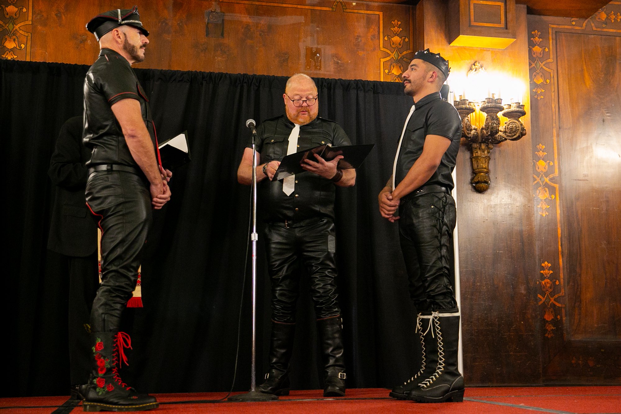  Sam, left and Oscar, right, are married in The Florentine Room during International Mister Leather 45, held at The Auditorium Theater, Saturday May 27, 2023, Chicago, IL.   The couple chose to be married at the event, surrounded by friends from thei