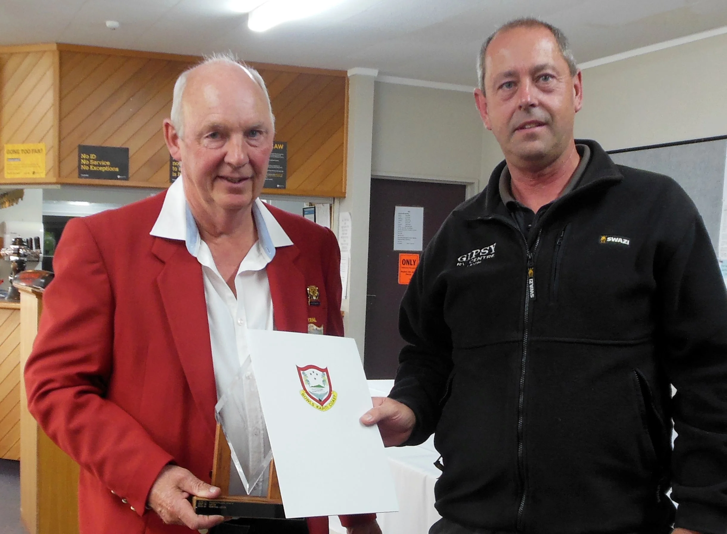 Central President Gary Burns receiving the Club of the Year trophy from our sponsor Brian Anderson of Gipsy RV Centre , Levin.