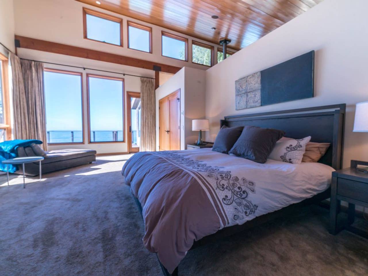 Shared King Bed + Twin Suite features huge windows and ocean views.