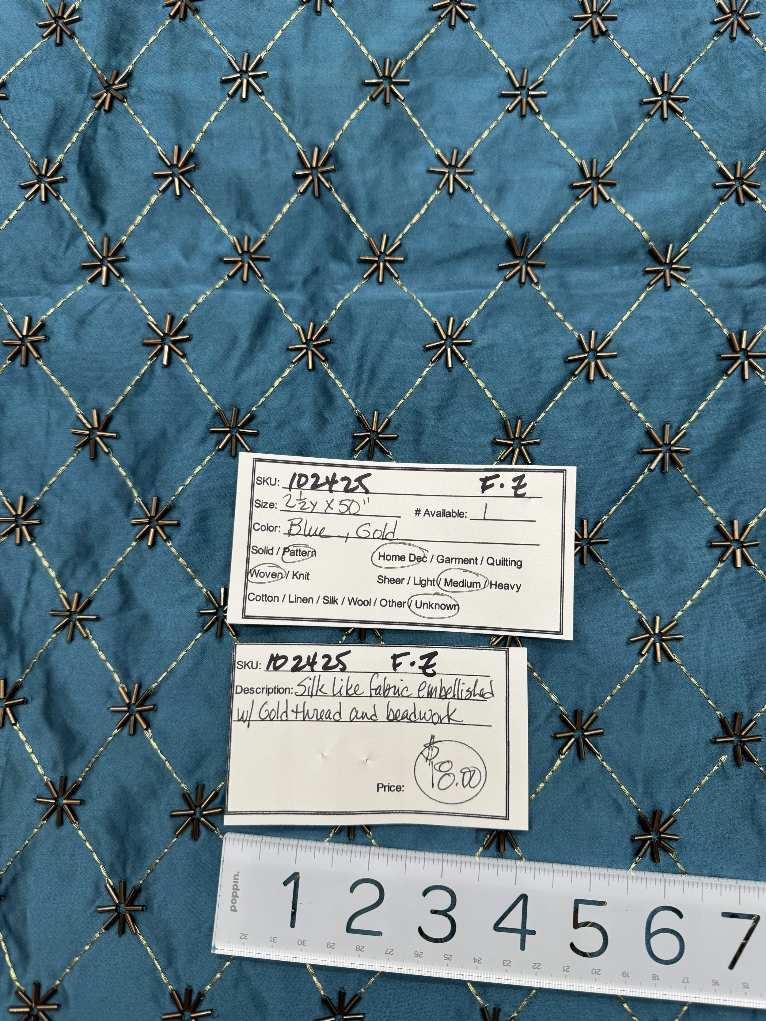 102425-F-Z Gold thread and bead work on blue; 2 1/2 yds x 50"