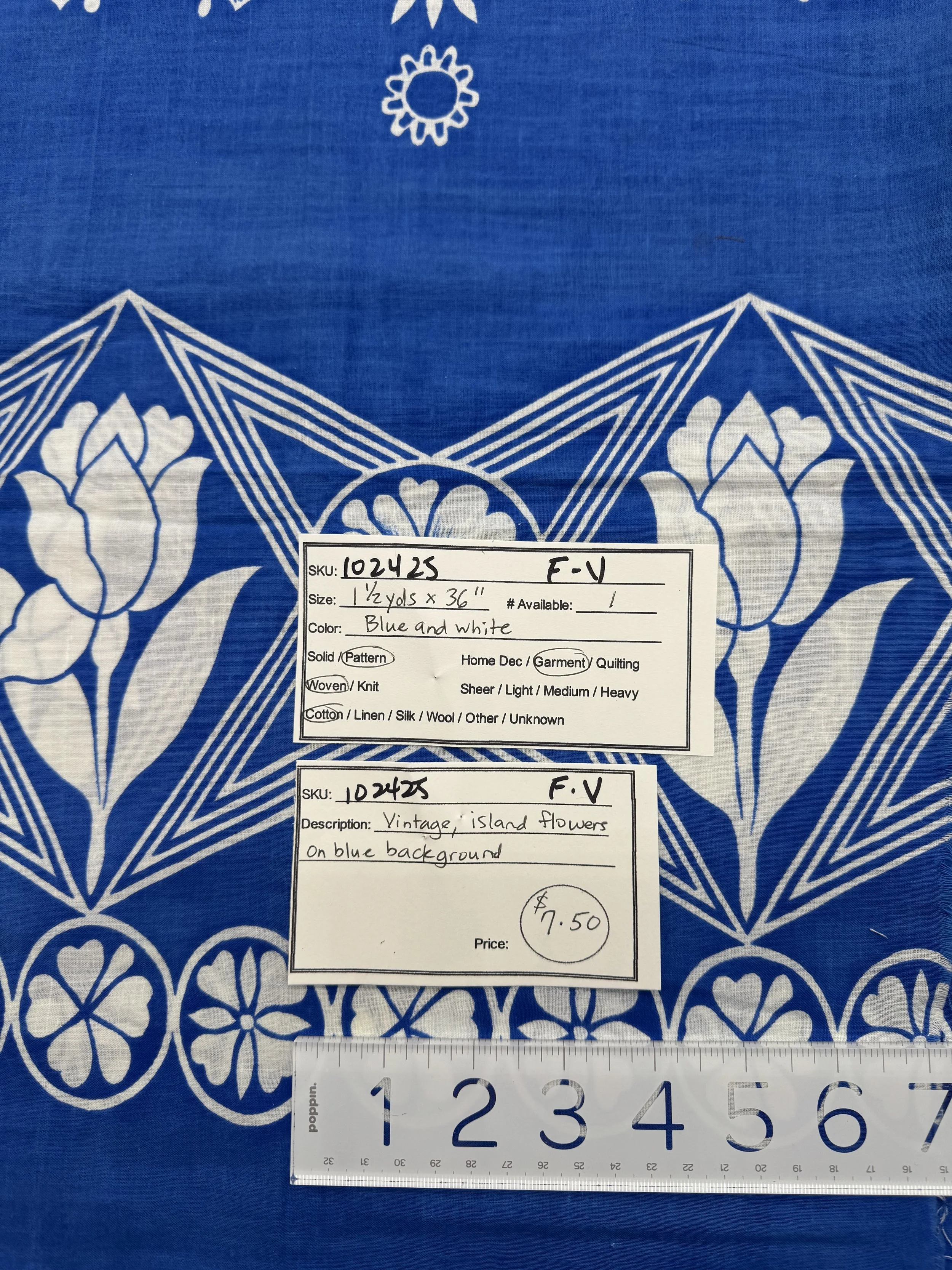 102425-F-V Vintage, island flowers on blue; Cotton; 1 1/2 yds x 36"