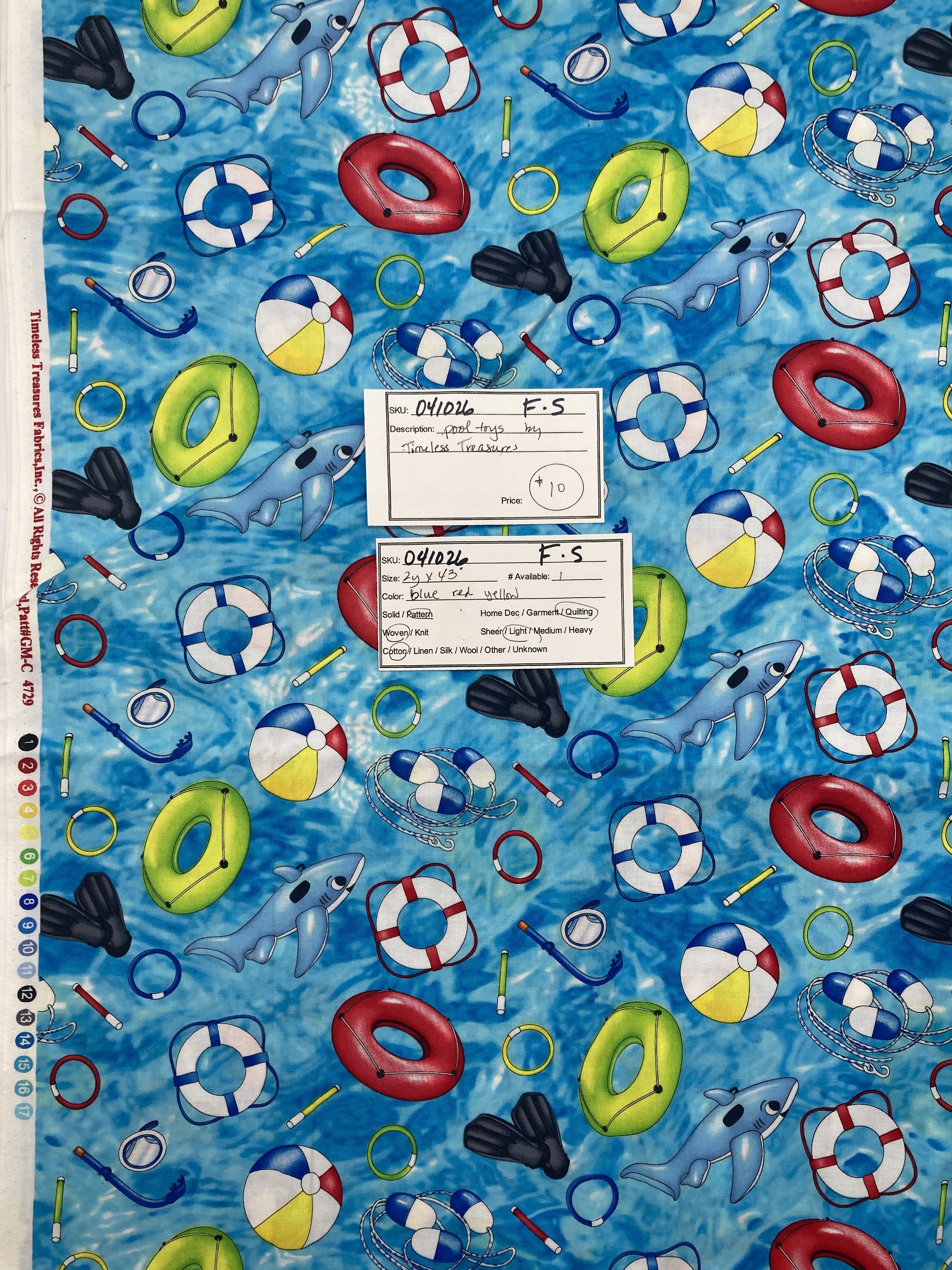 041026-F-S Pool toys on blue; Cotton;2 yds x 43"