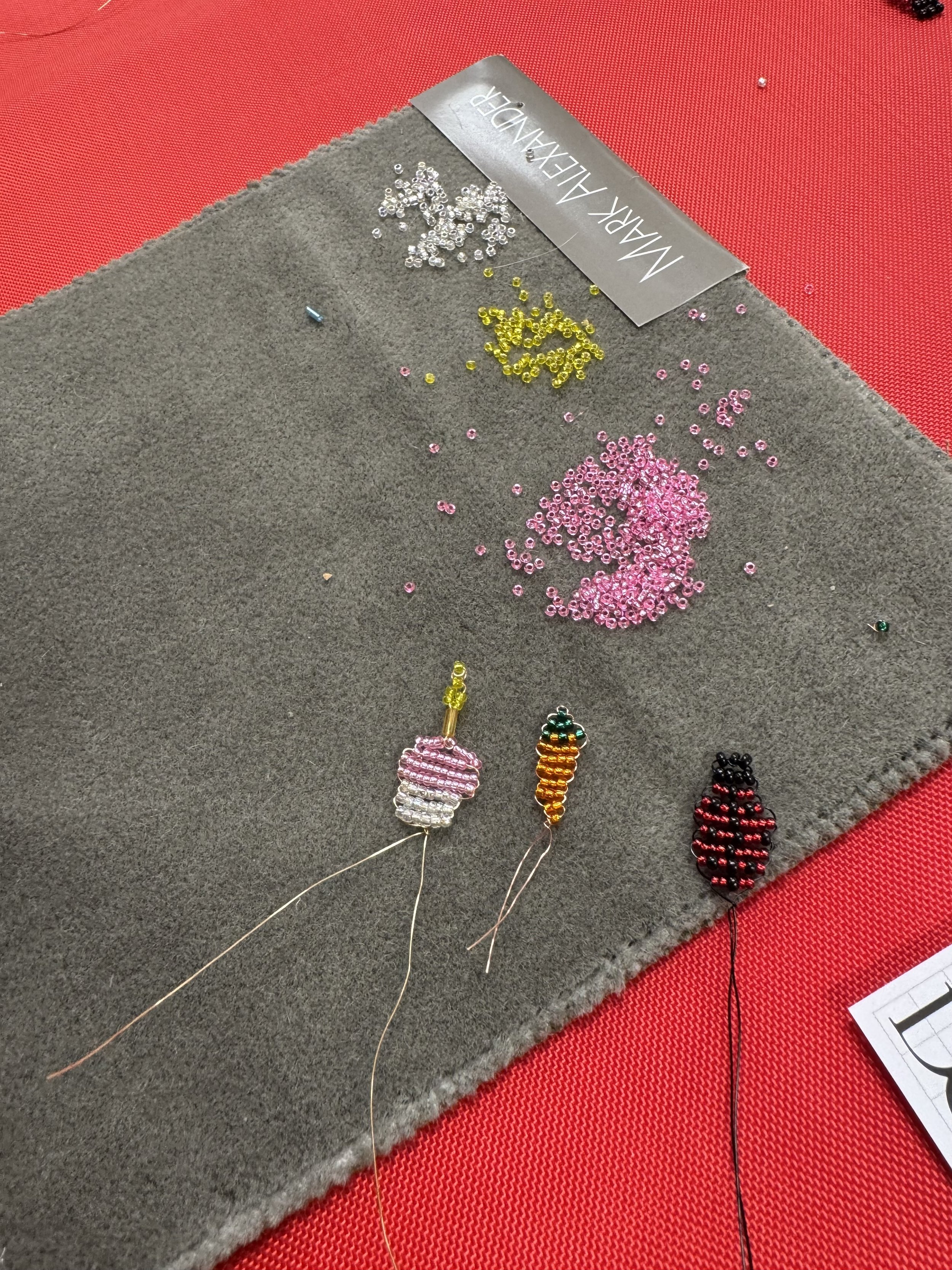 Small beads and beaded designs on velvet surface