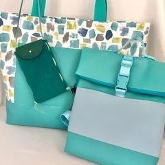 Teal tote bag and matching accessory cases