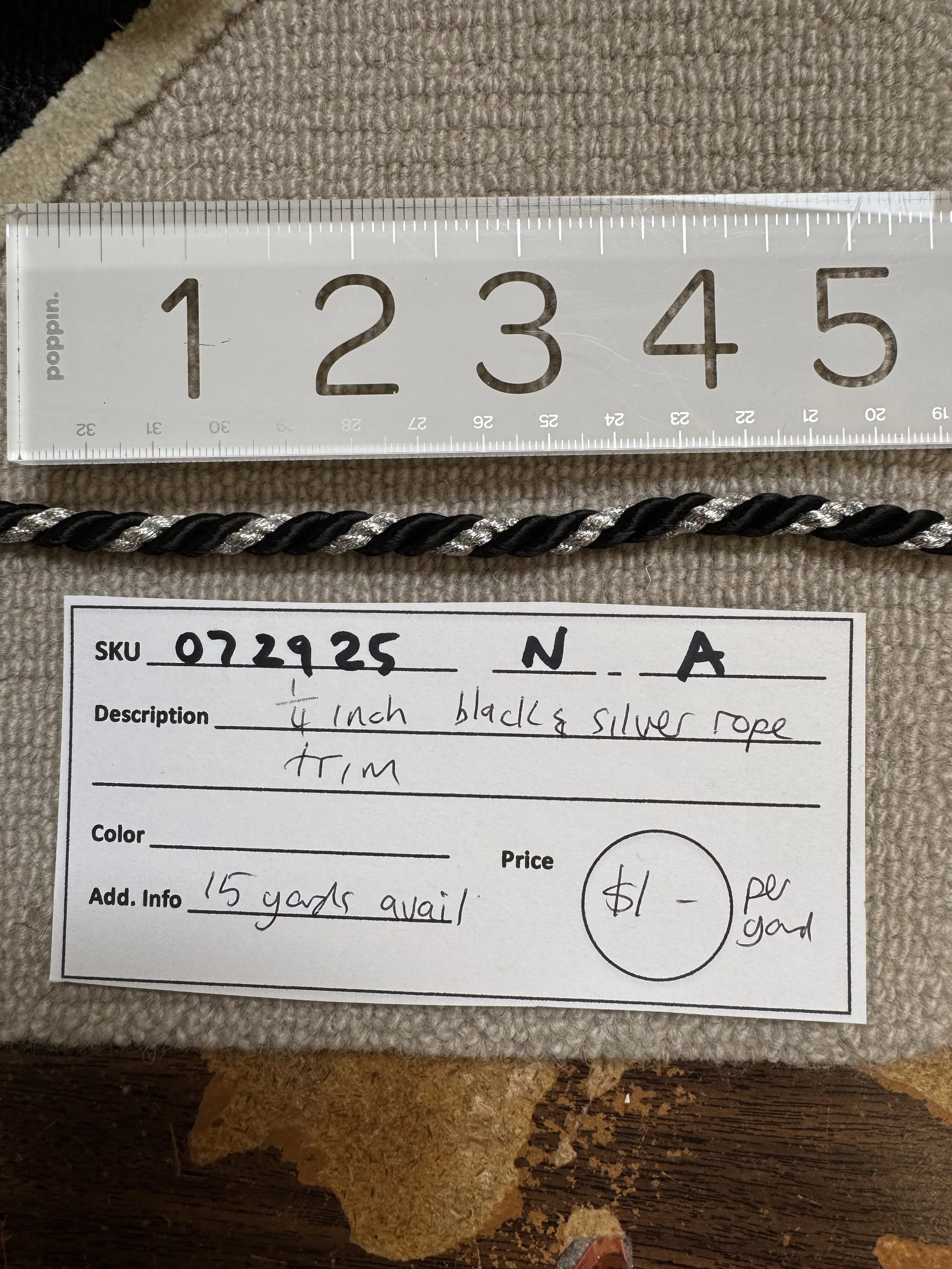 07295-N-A Black and silver rope trim; 1/4'' wide, sold by the yard