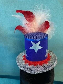 Blue and silver hat with red and white trims