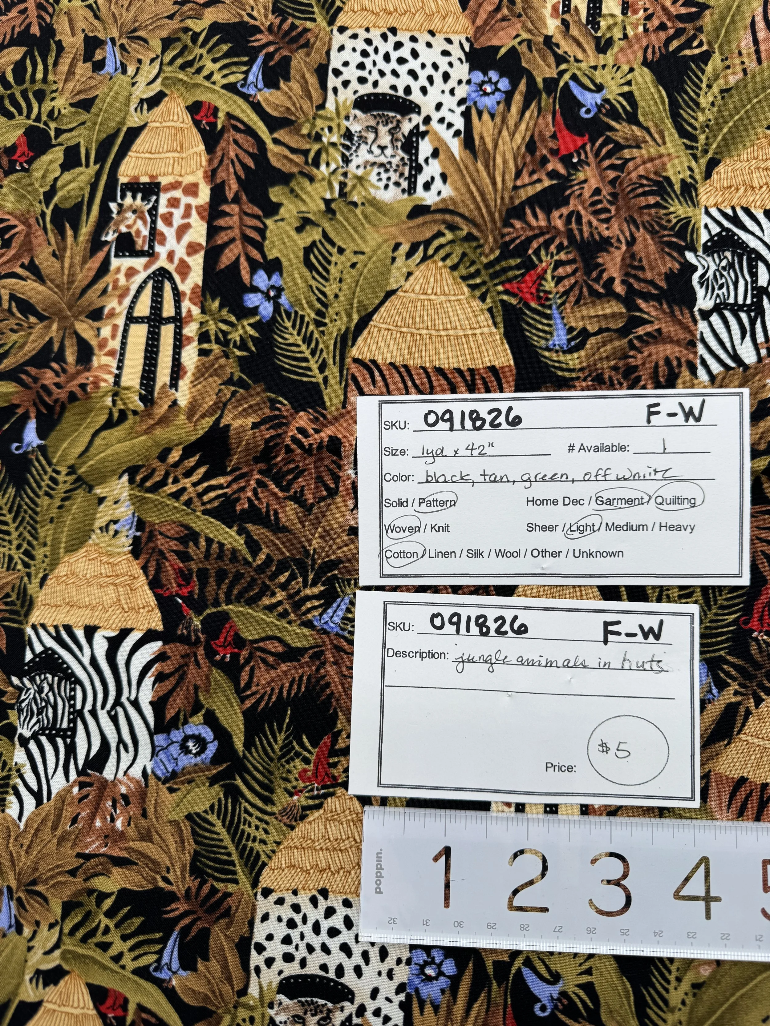 091826-F-W Jungle animals in huts; Cotton; 1 yd x 42"