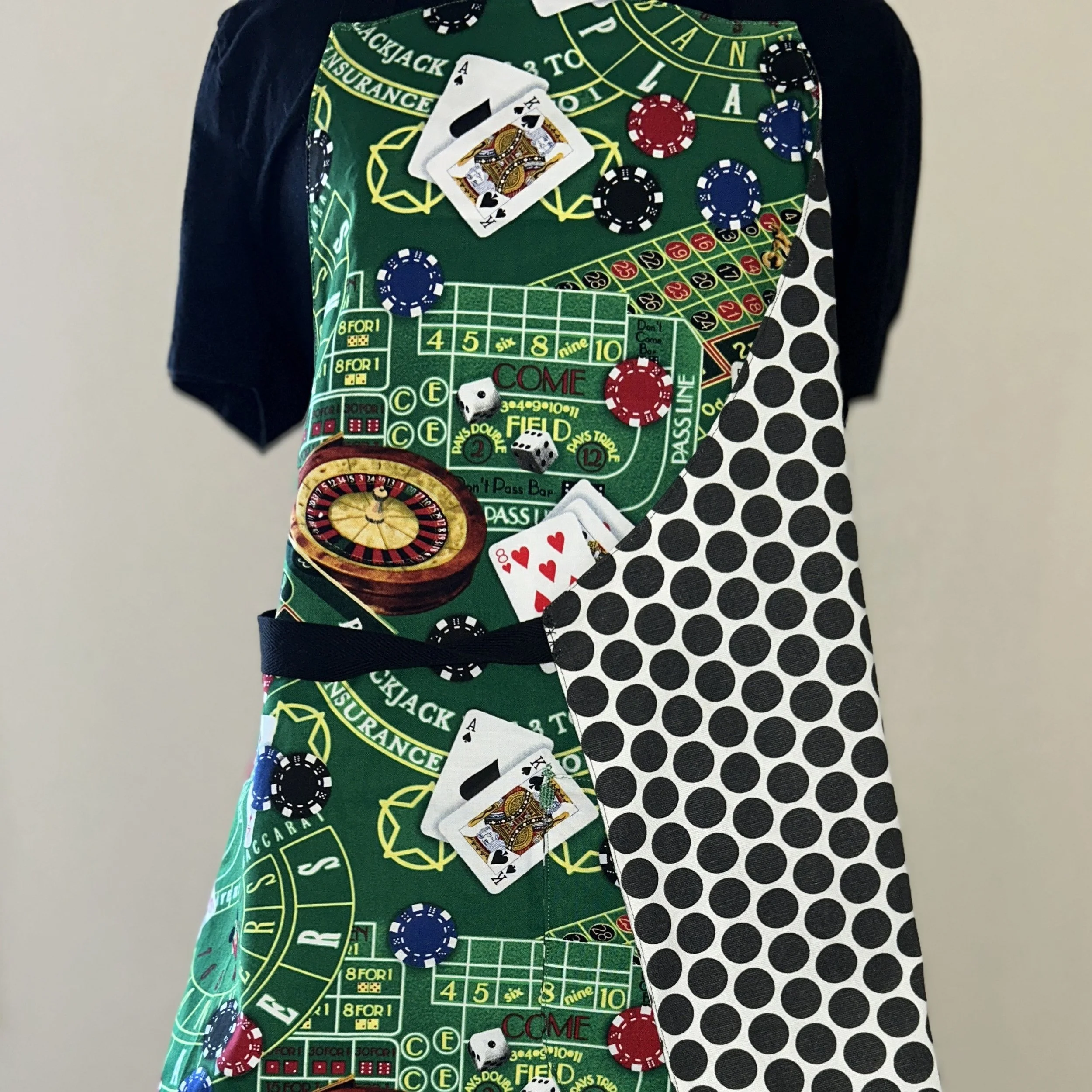 Green apron with poker themed fabric