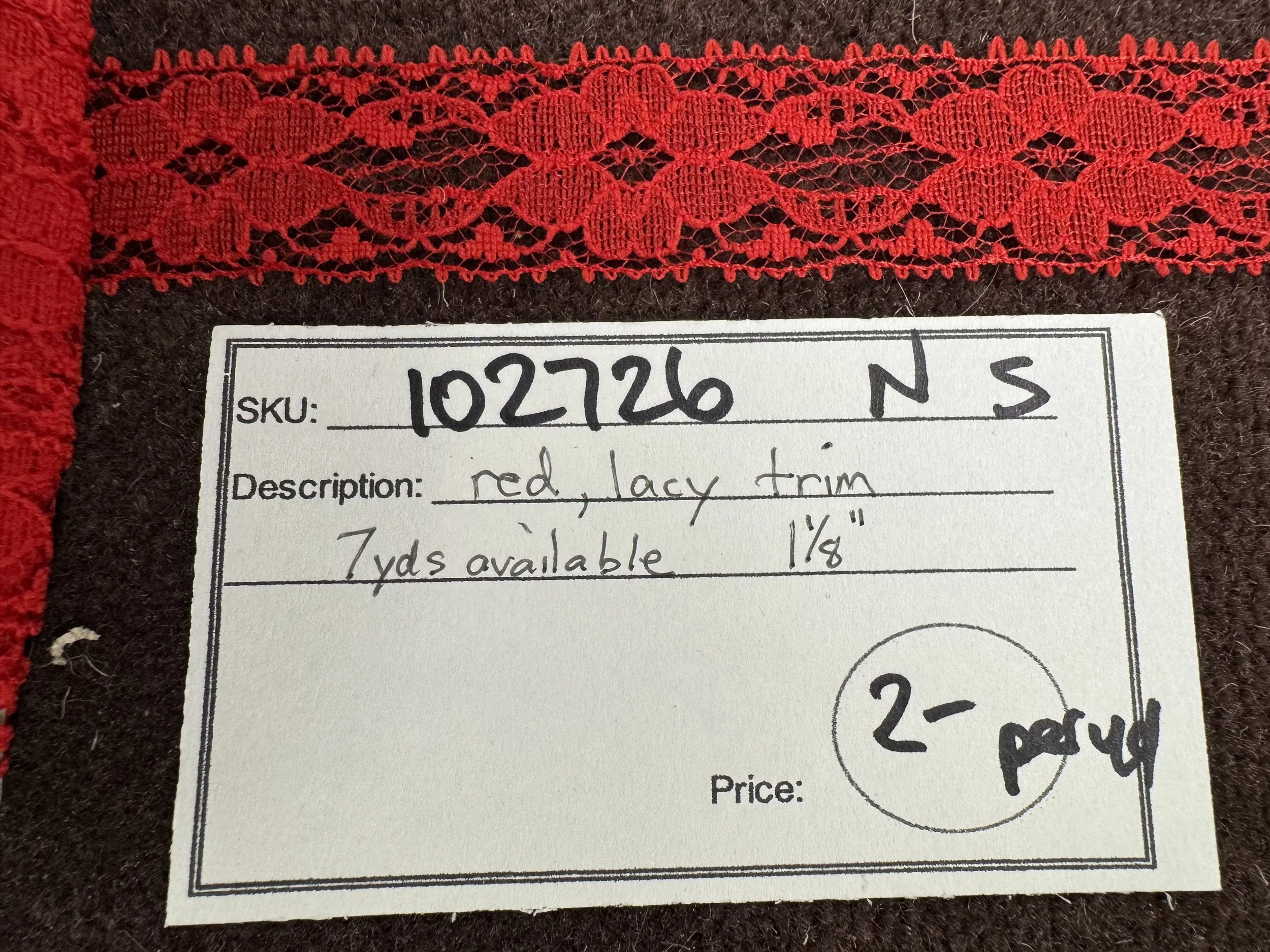 102726-N-S Red lacy trim, 1 1/8" wide; by the yard