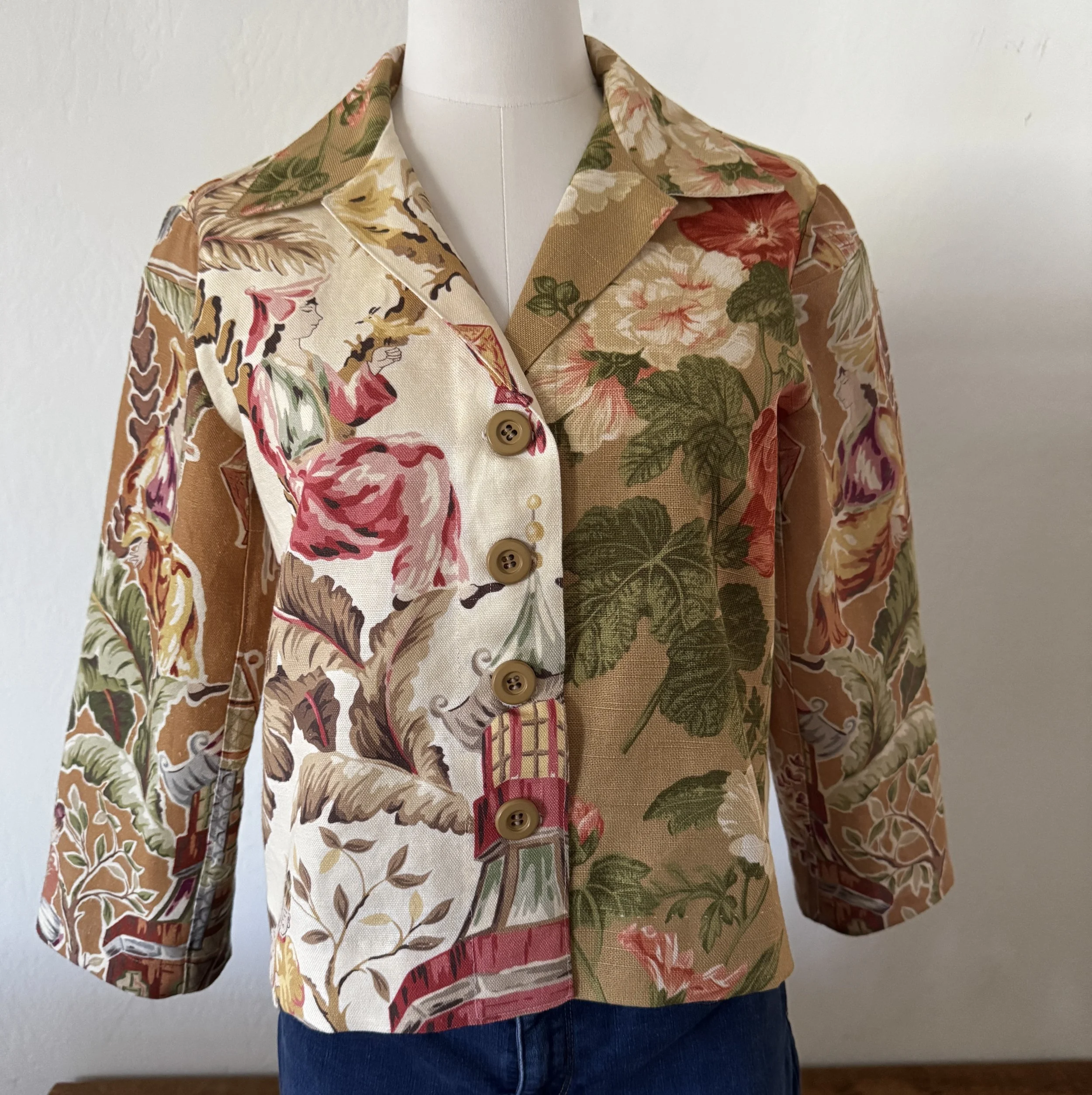 Mannequin modeling blazer made from fabric with large floral design