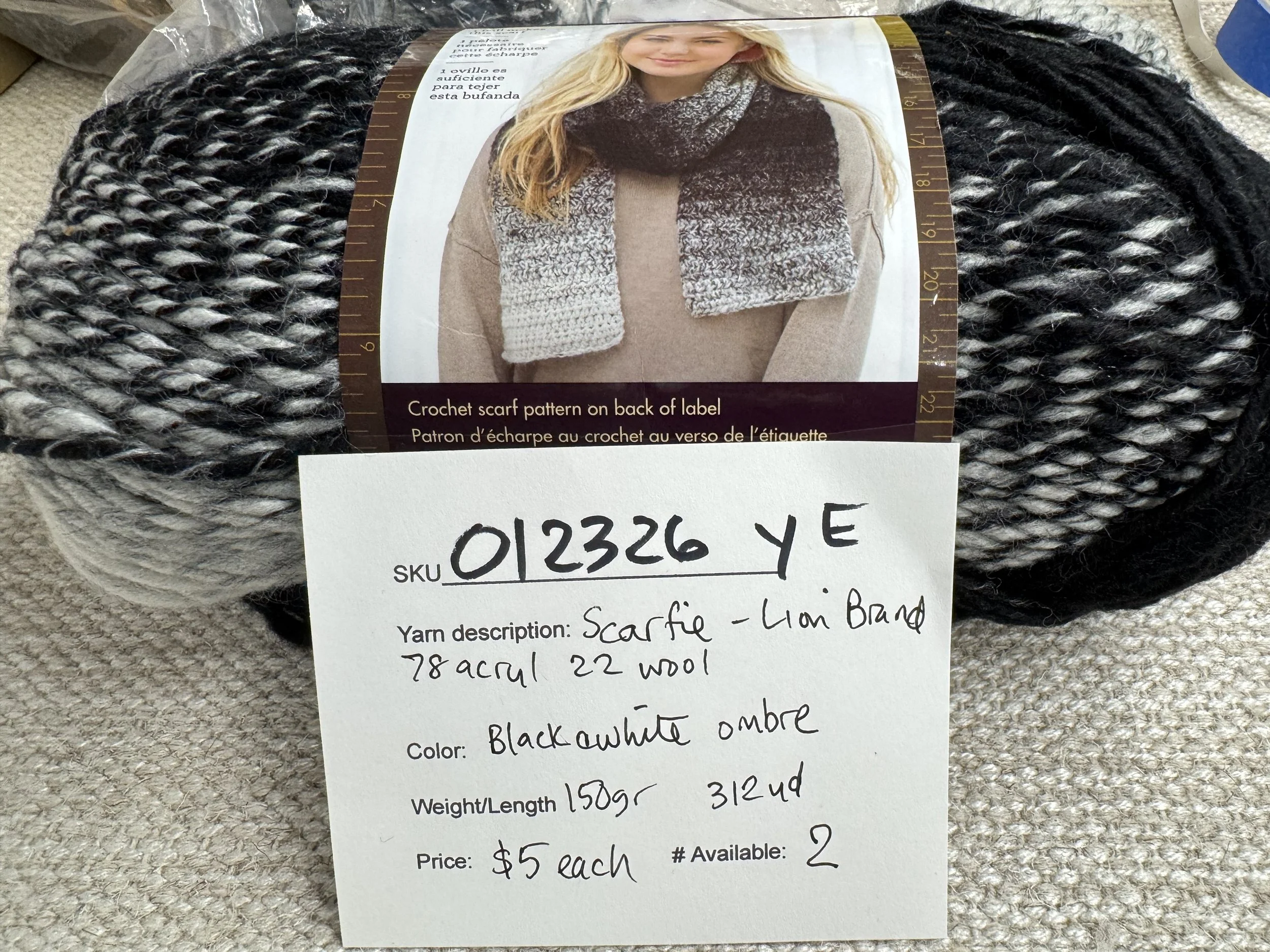 012326-Y-E Lion's Scarfie acrylic/wool, black/white, 150g, 312 yd, 2 available