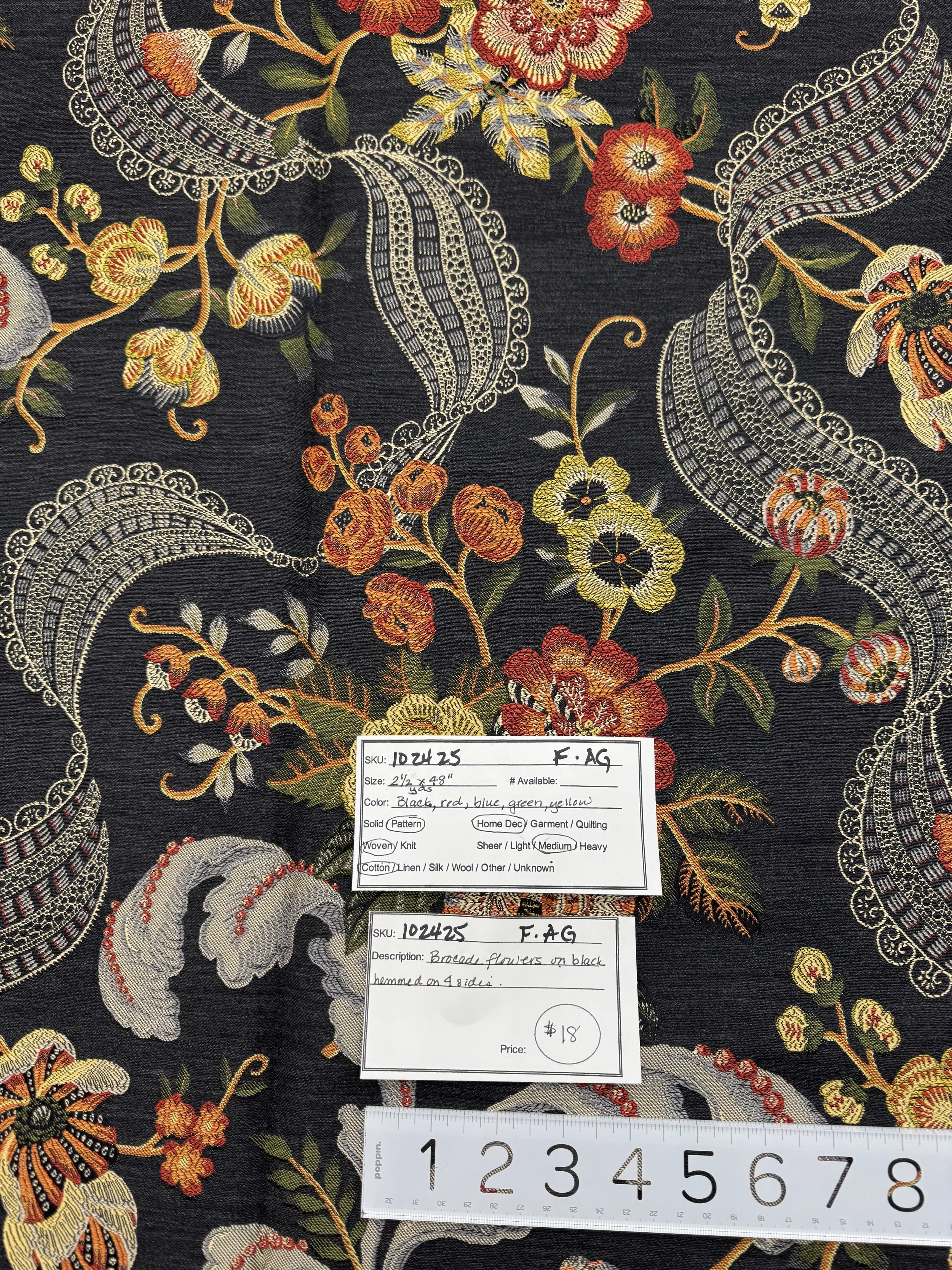 102425-F-AG Brocade flowers on black; Cotton; 2 1/2 yds x 48"