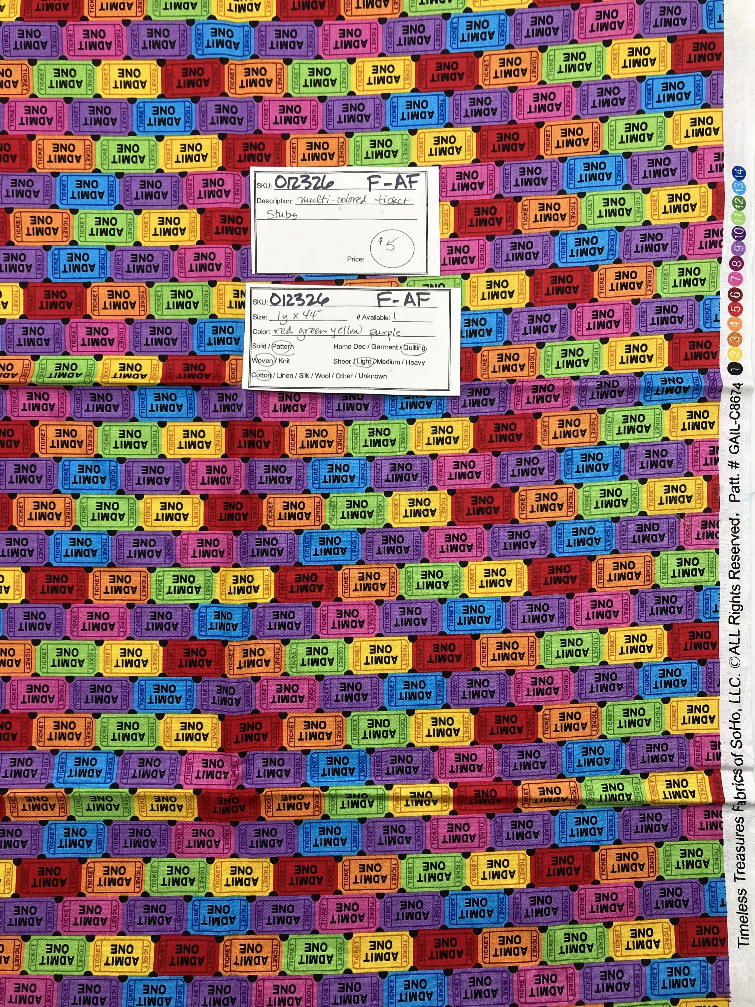 012326-F-AF Multicolored ticket stubs; Cotton; 1 yd x 44"