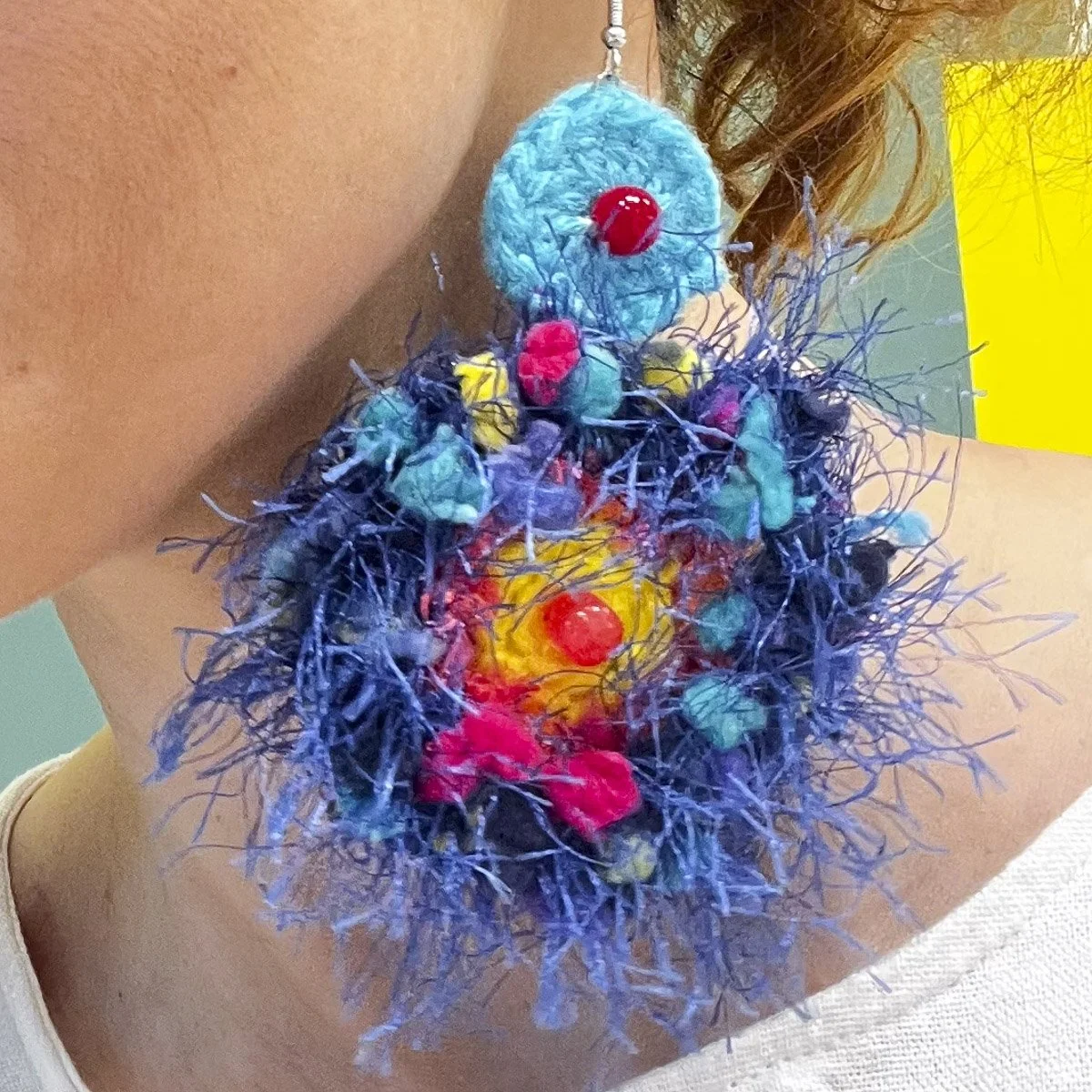 Blue crocheted earring