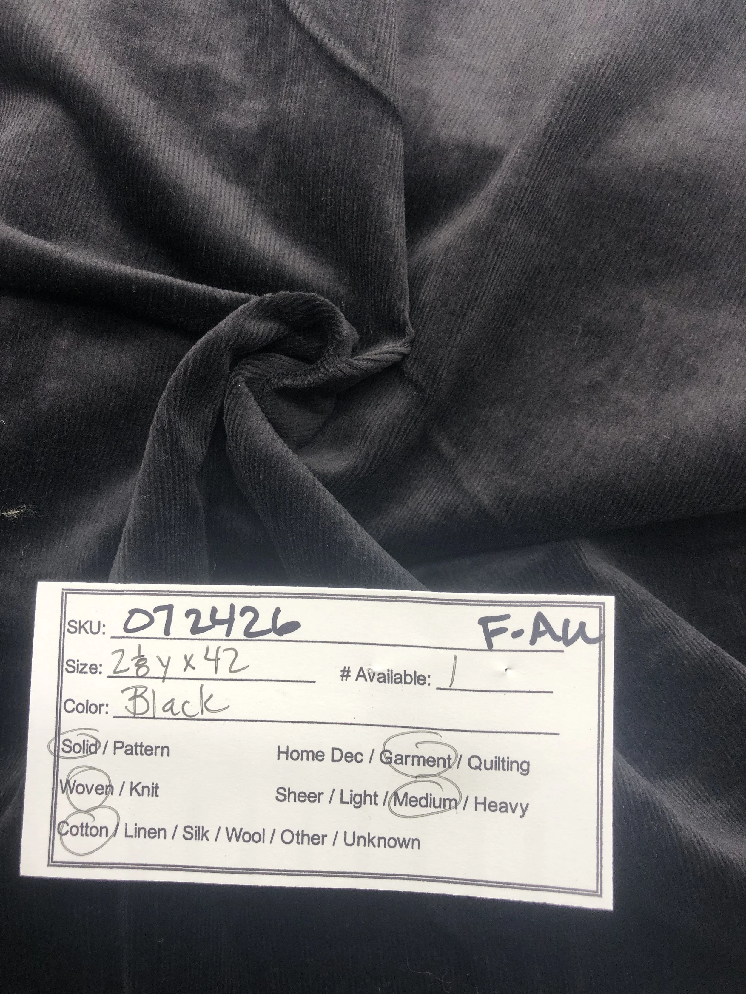 072426-F-AU  Black pin wale corduroy; Cotton; 2 1/8 yds x 42"