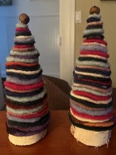 Two decorative trees made from fabric scraps