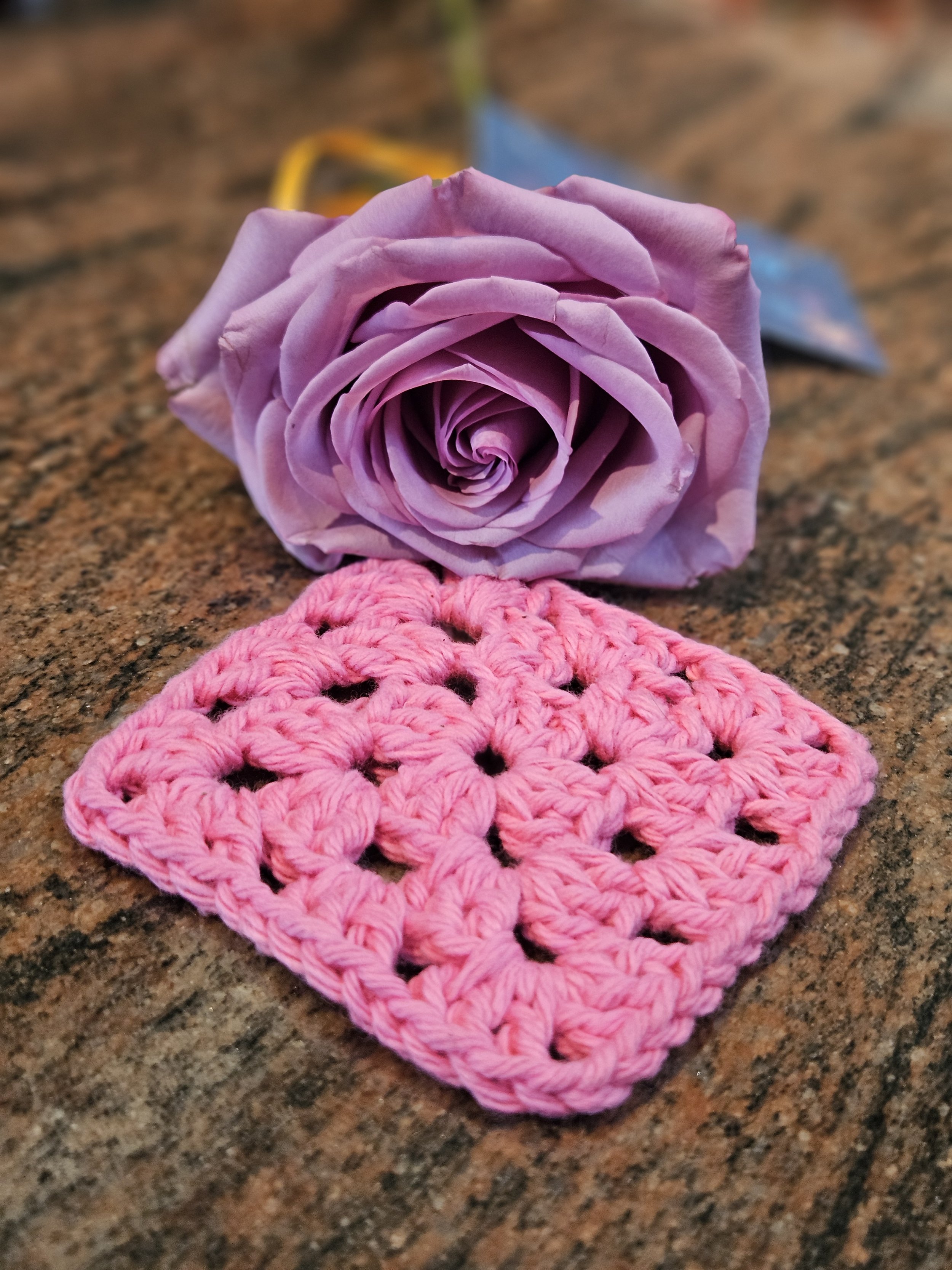 Purple rose and pink crocheted granny square