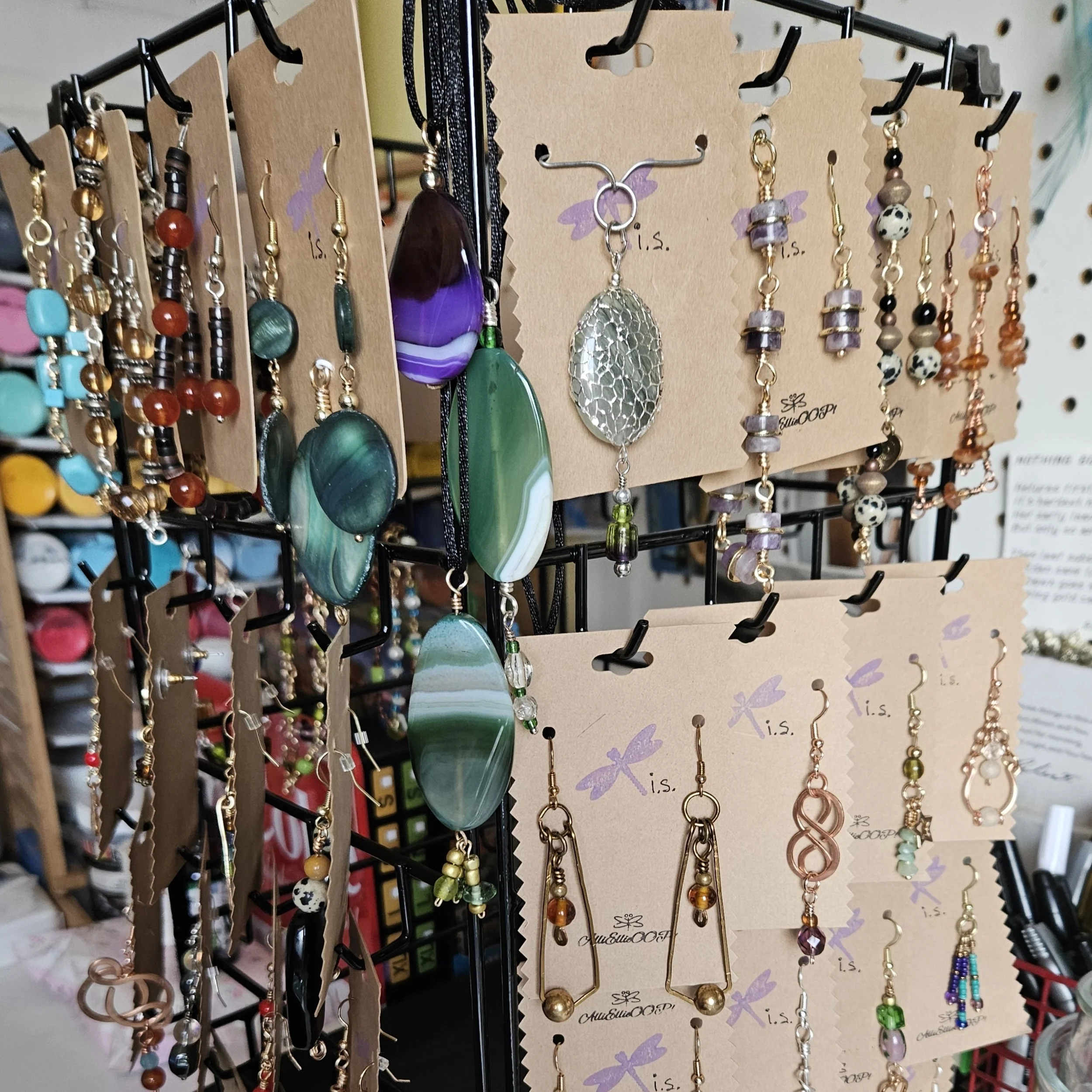Retail display rack with beaded earrings and bracelets