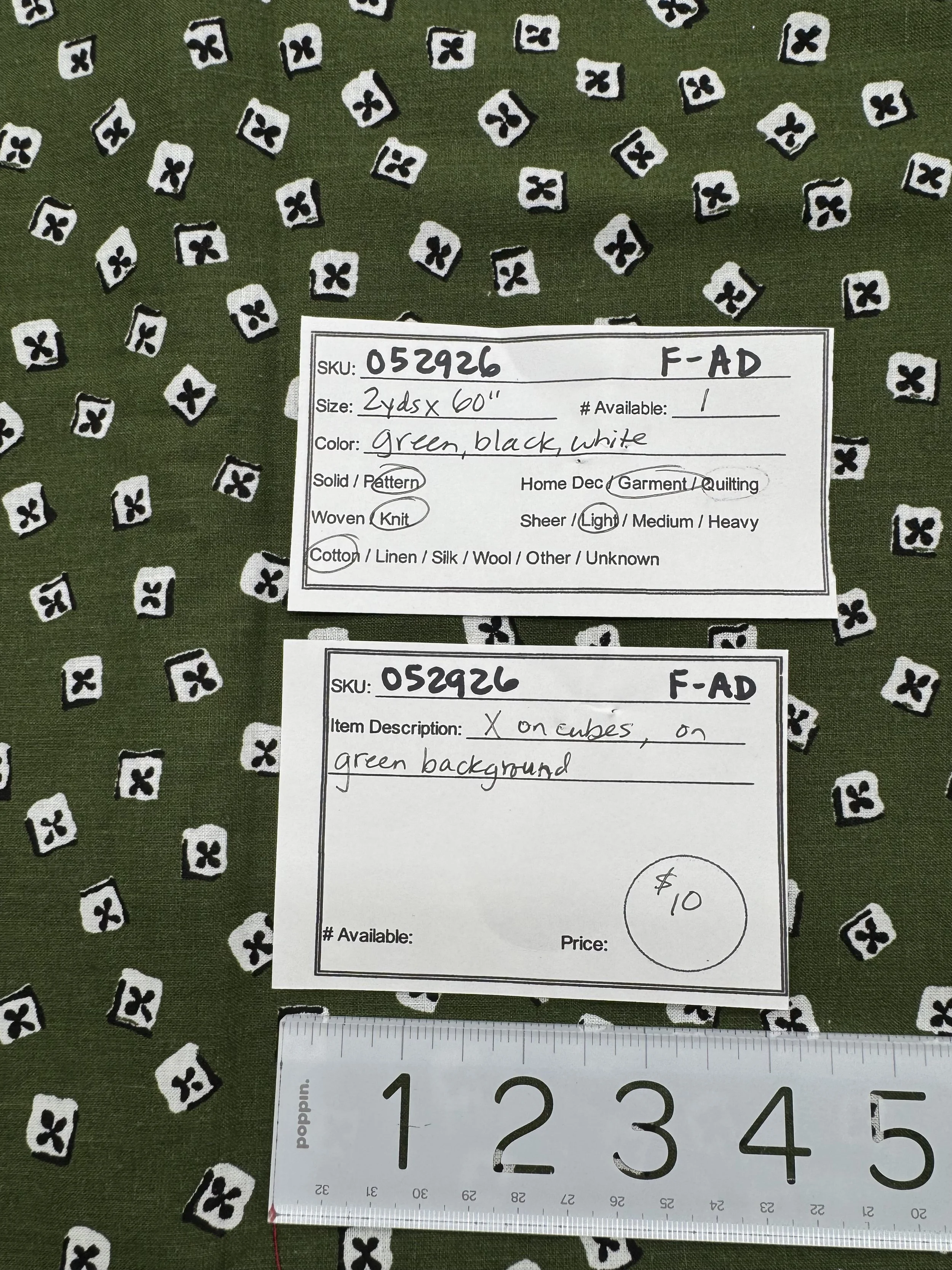 052926-F-AD Small cubes on green, Cotton; 2 yd x 60"