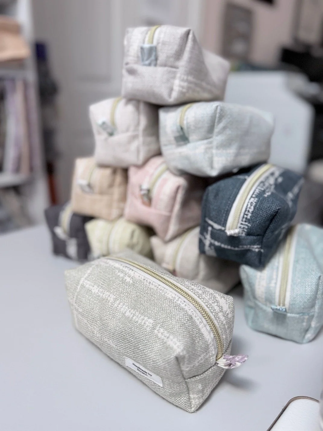 Stack of handmade zipper pouches