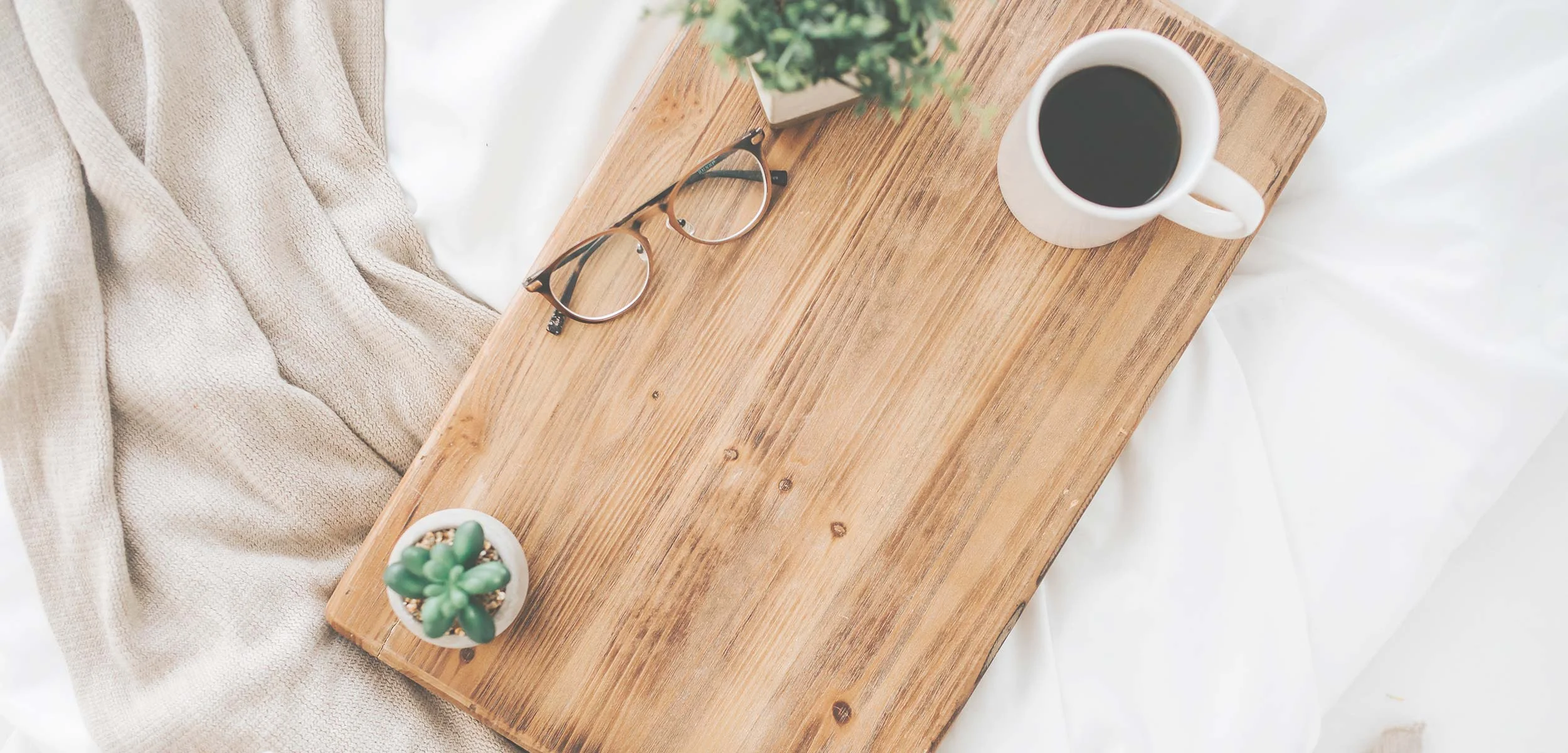 cozy-workday-for-a-squarespace-website-designer-working-in-bed-with-coffee.jpg