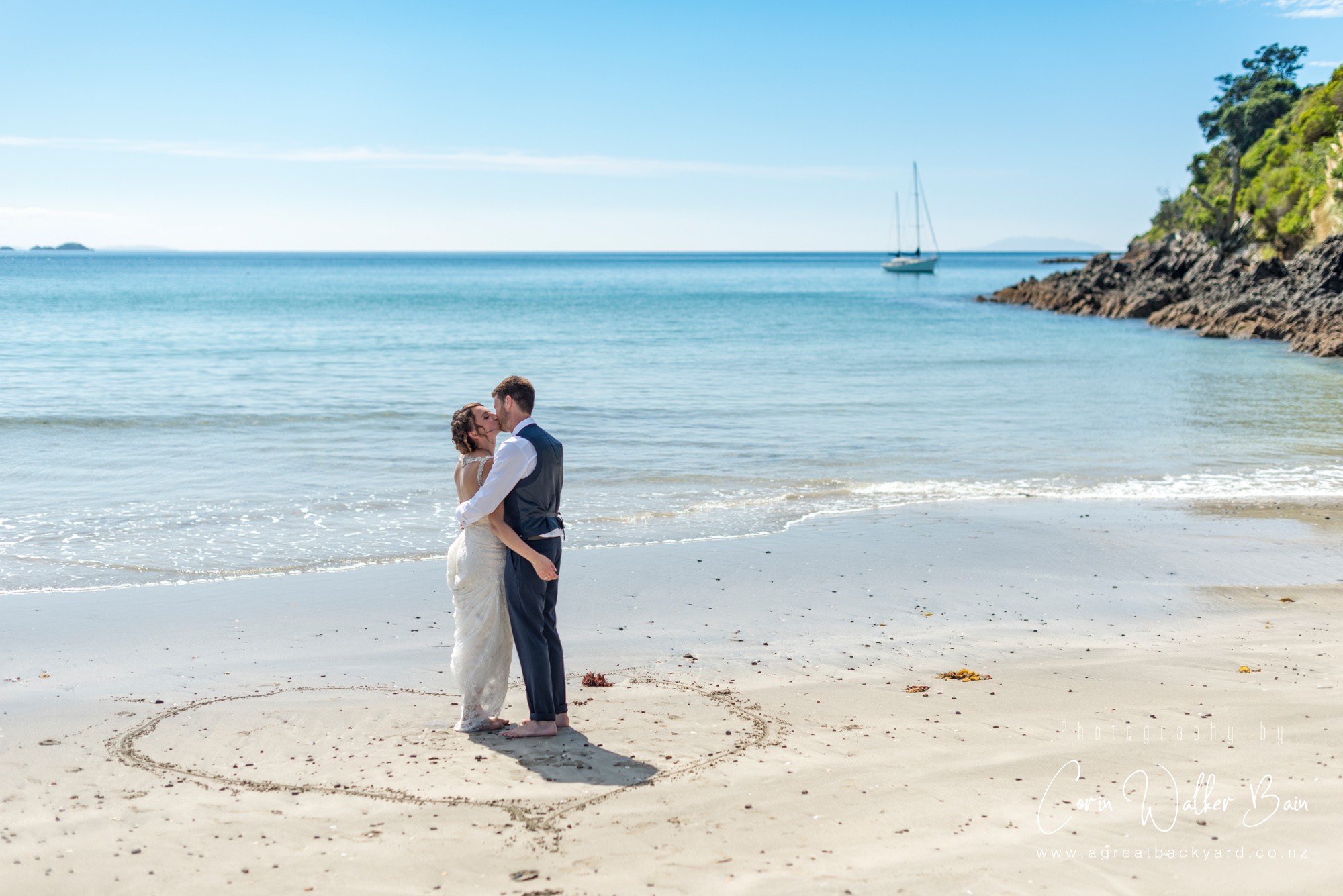 Life's a beach at Andy and Emma's Waiheke Island wedding by New Zealand wedding photographer Corin Walker Bain of a great backyard