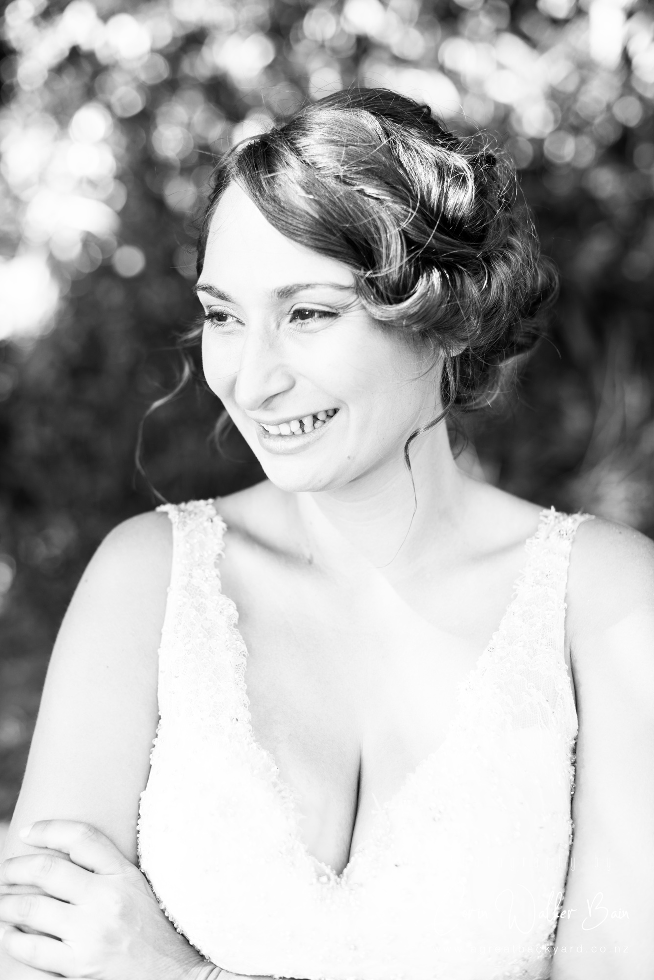 Beautiful Emma at Andy and Emma's Waiheke Island wedding by New Zealand wedding photographer Corin Walker Bain of a great backyard