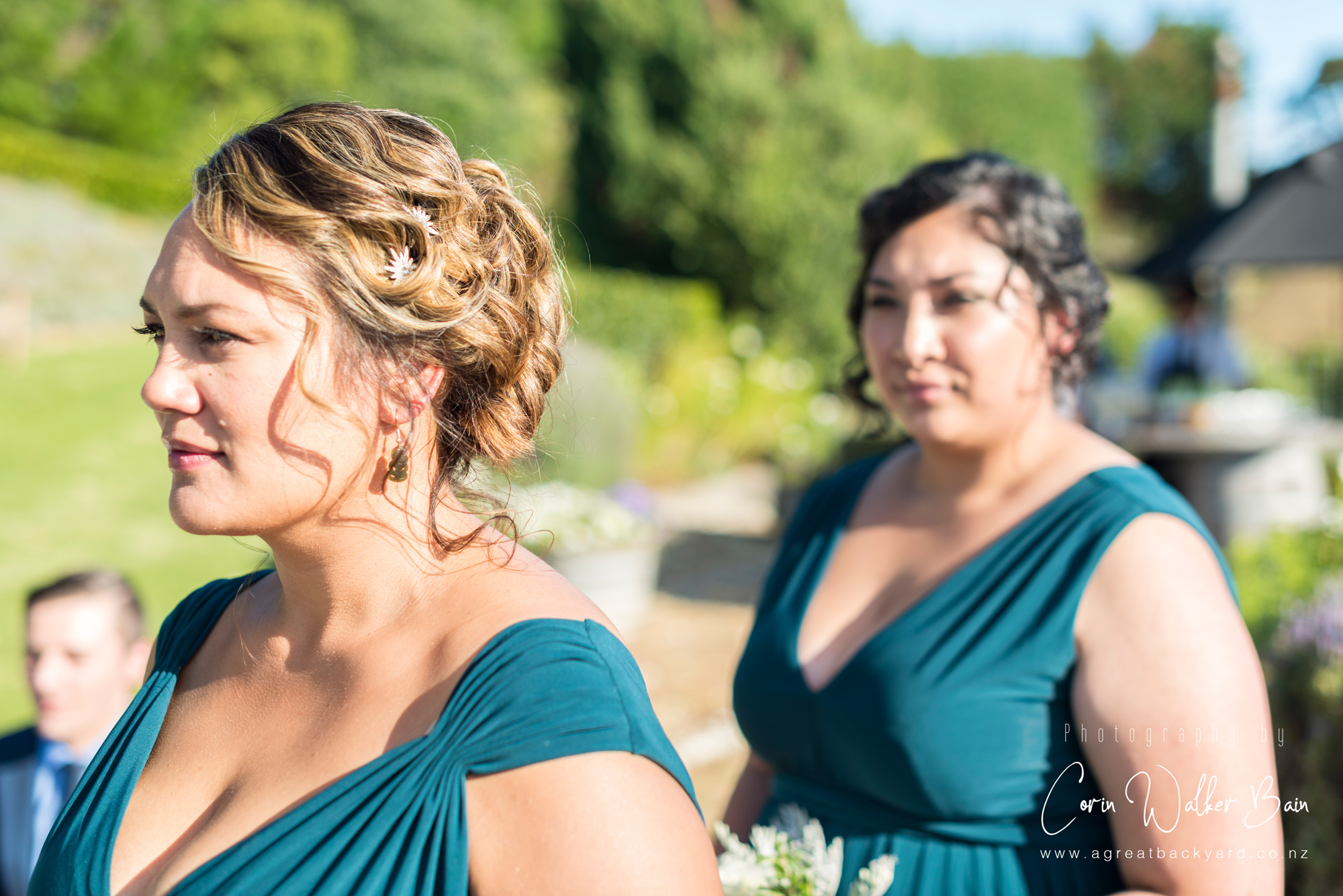 Bridesmaids at Andy and Emma's Waiheke Island wedding by New Zealand wedding photographer Corin Walker Bain of a great backyard
