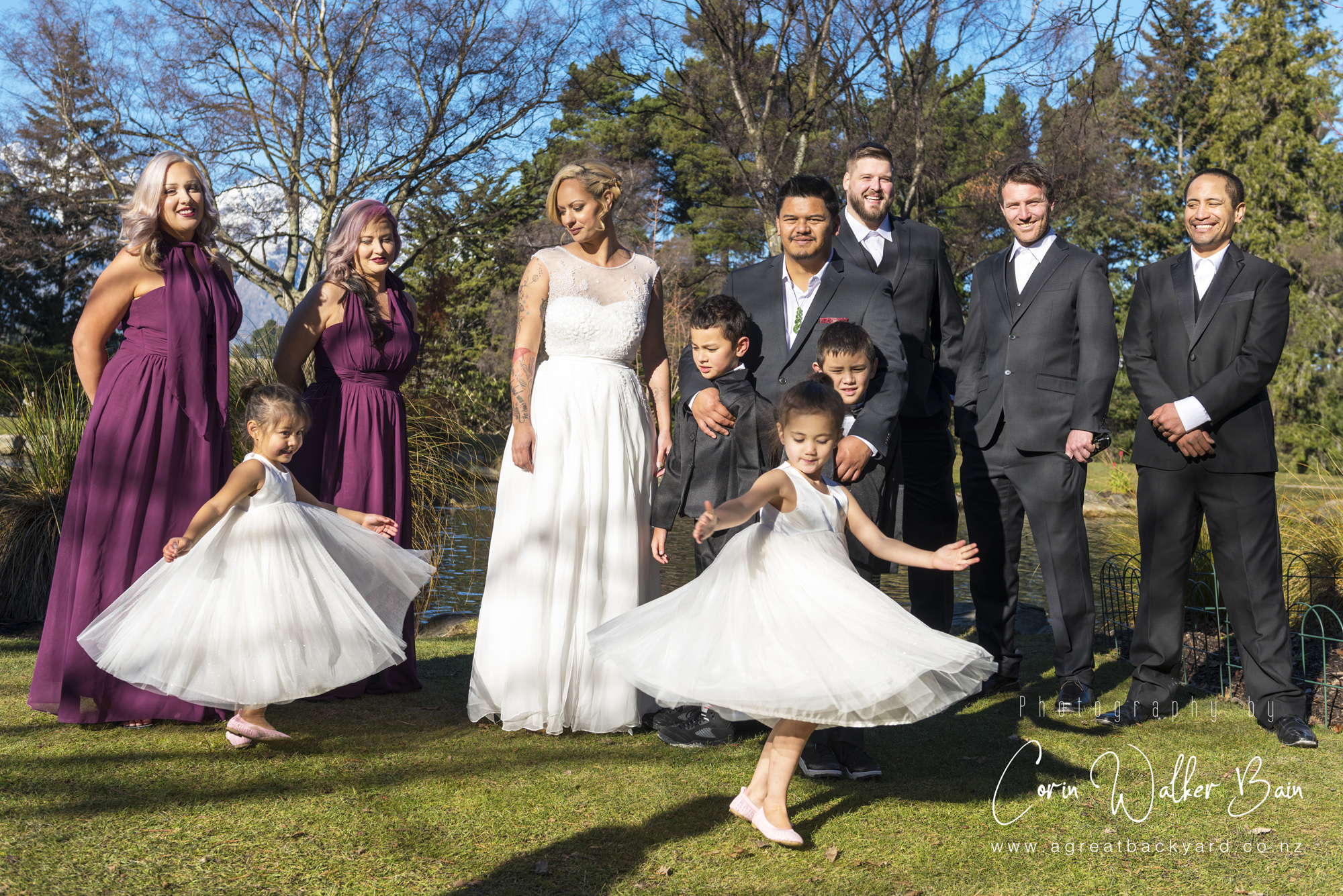 Swirling at Jah and Teri's Queenstown wedding by New Zealand wedding photographer Corin Walker Bain of a great backyard